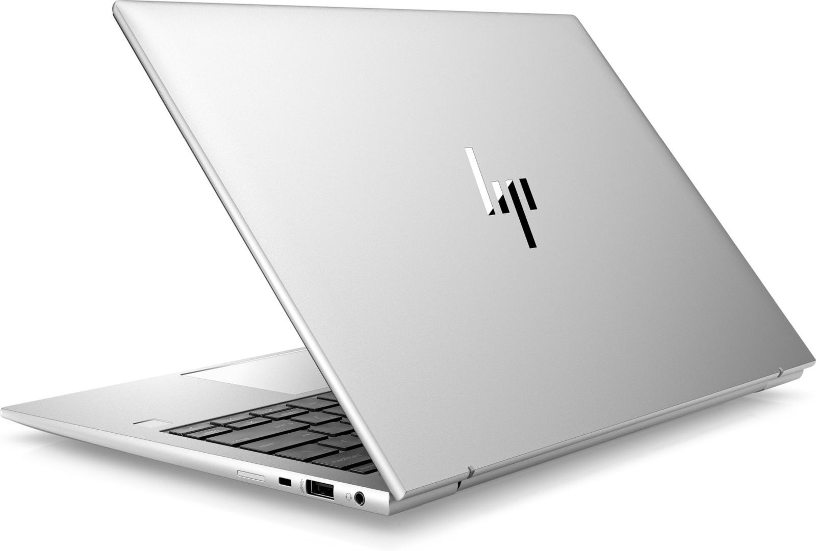 Silberner Laptop mit HP-Logo auf dem Deckel, geöffnet und leicht angewinkelt.