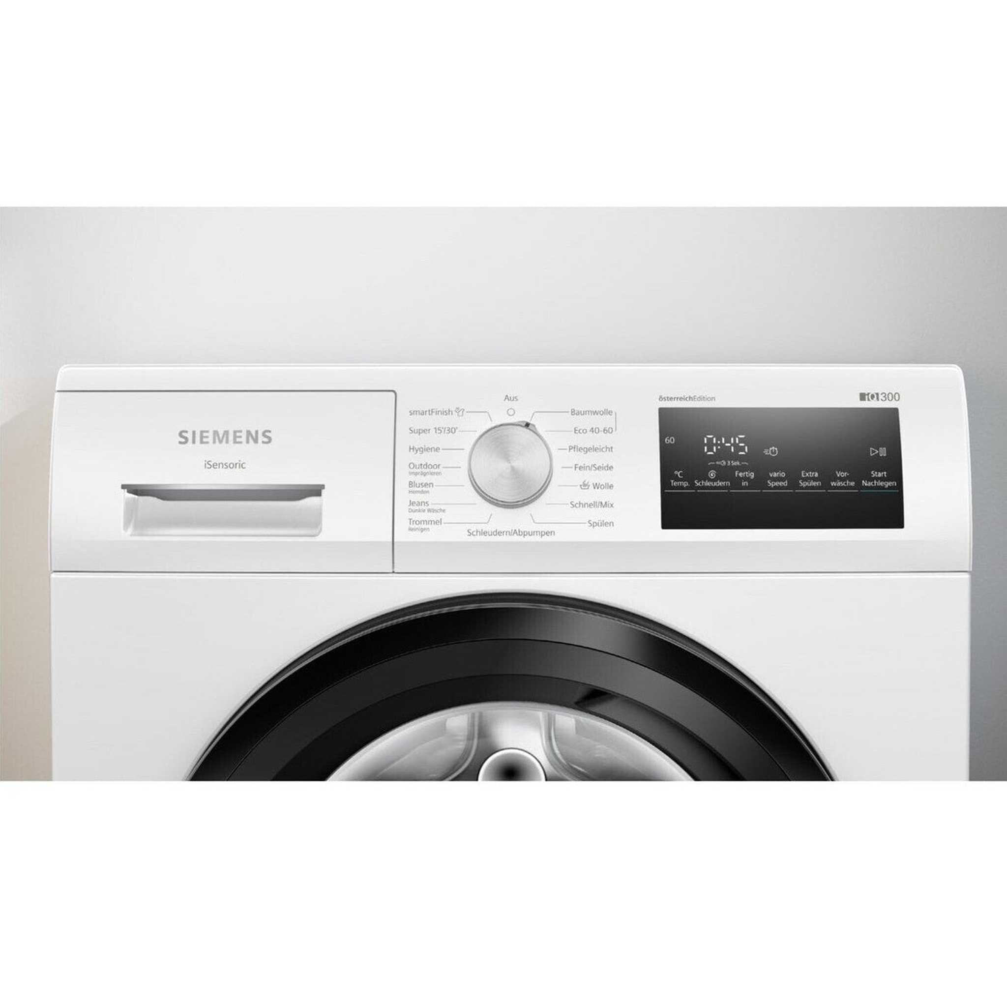 White Siemens washing machine control panel with digital display and various buttons.