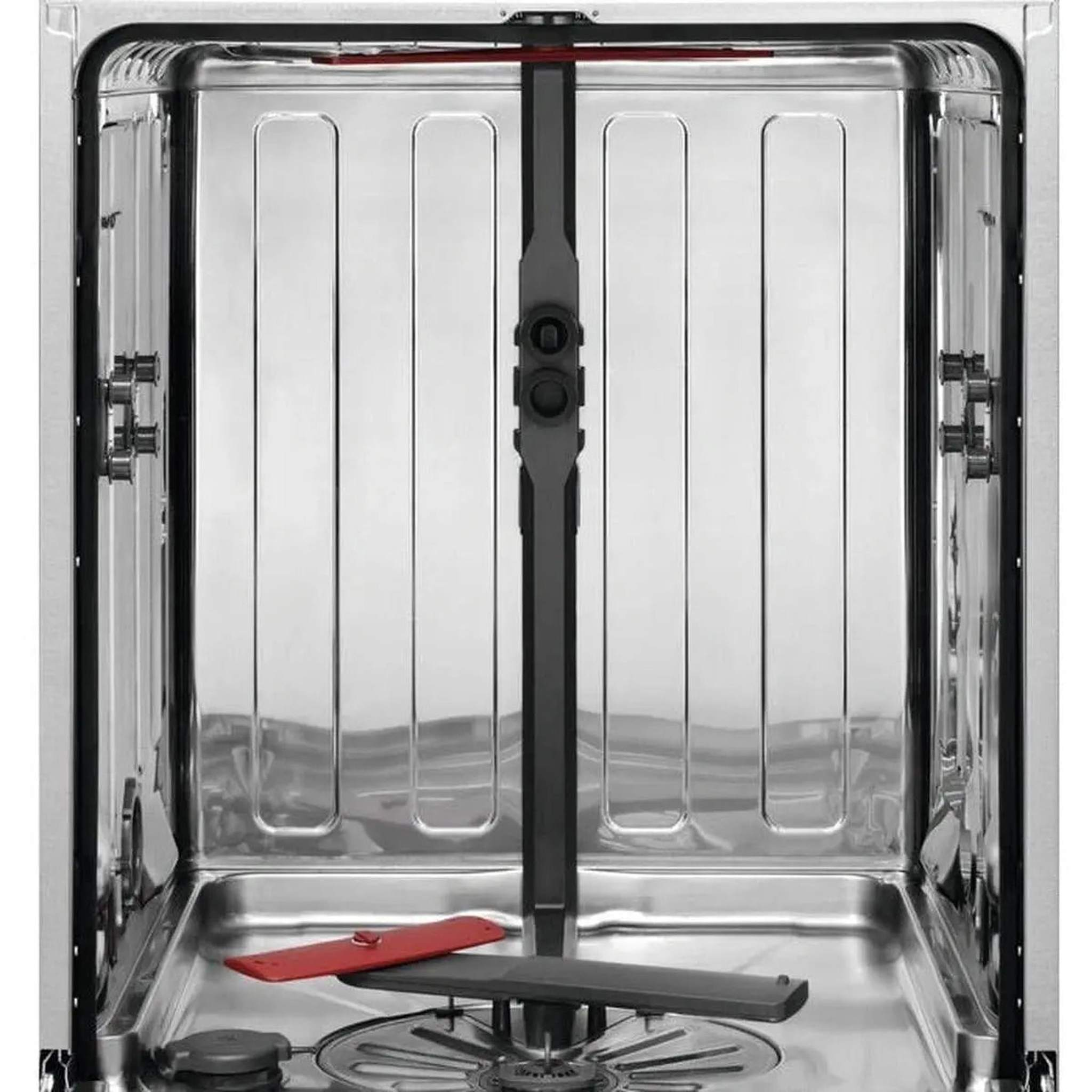 Intérieur d'un lave-vaisselle. En acier inoxydable. Objet rouge et support gris visibles.