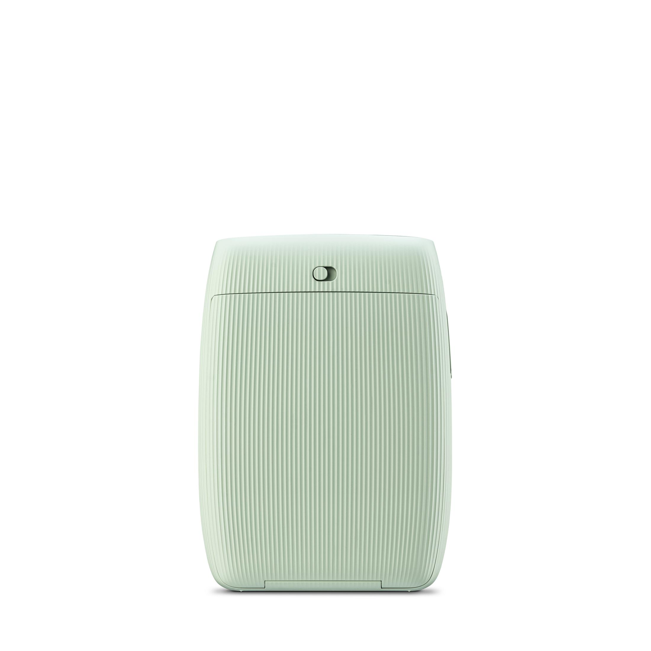 Een lichtgroene printer met verticale ribbels staat gecentreerd op een witte achtergrond.