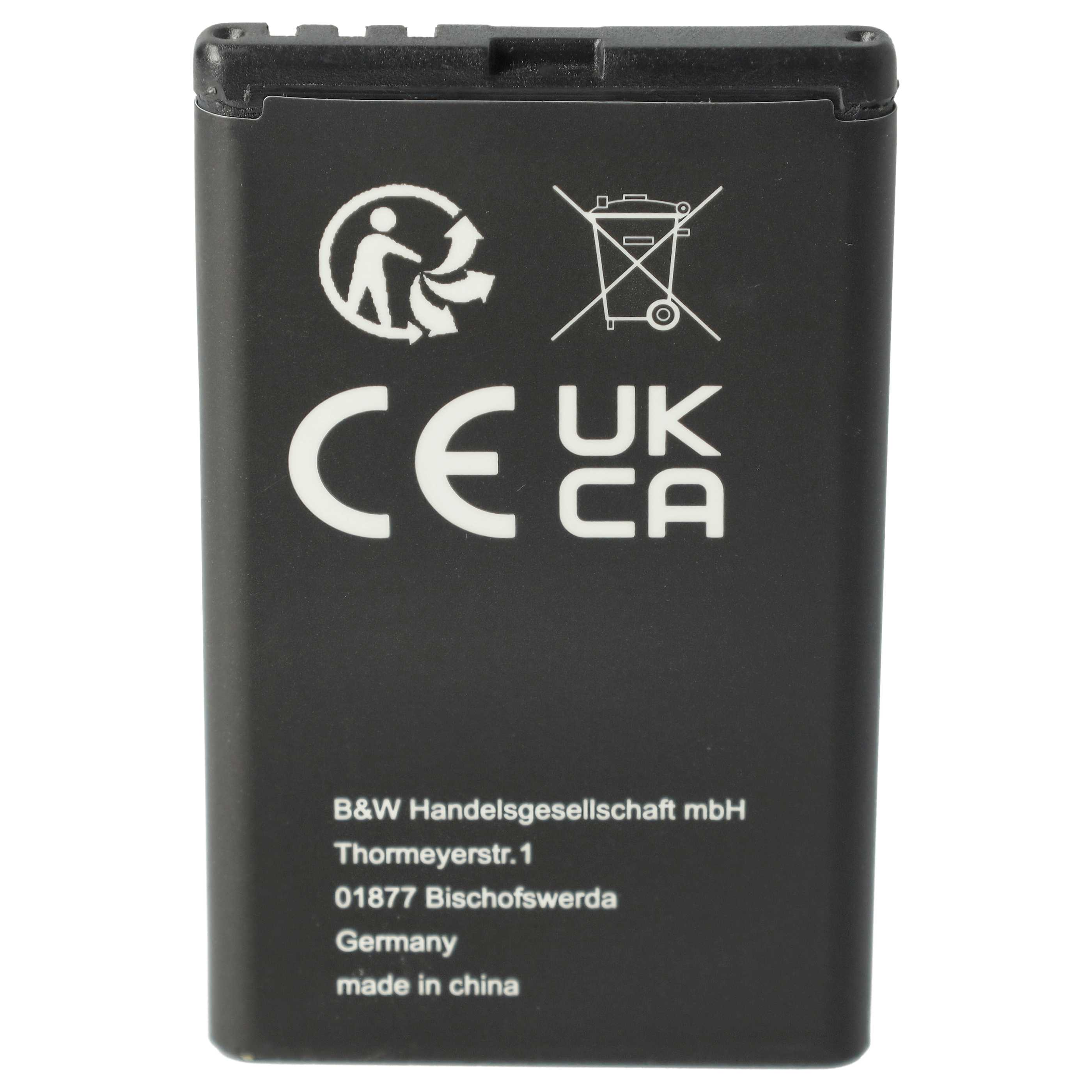 Schwarze Batterie mit Text und Symbolen, einschließlich CE- und UKCA-Zeichen. Weißer Hintergrund.