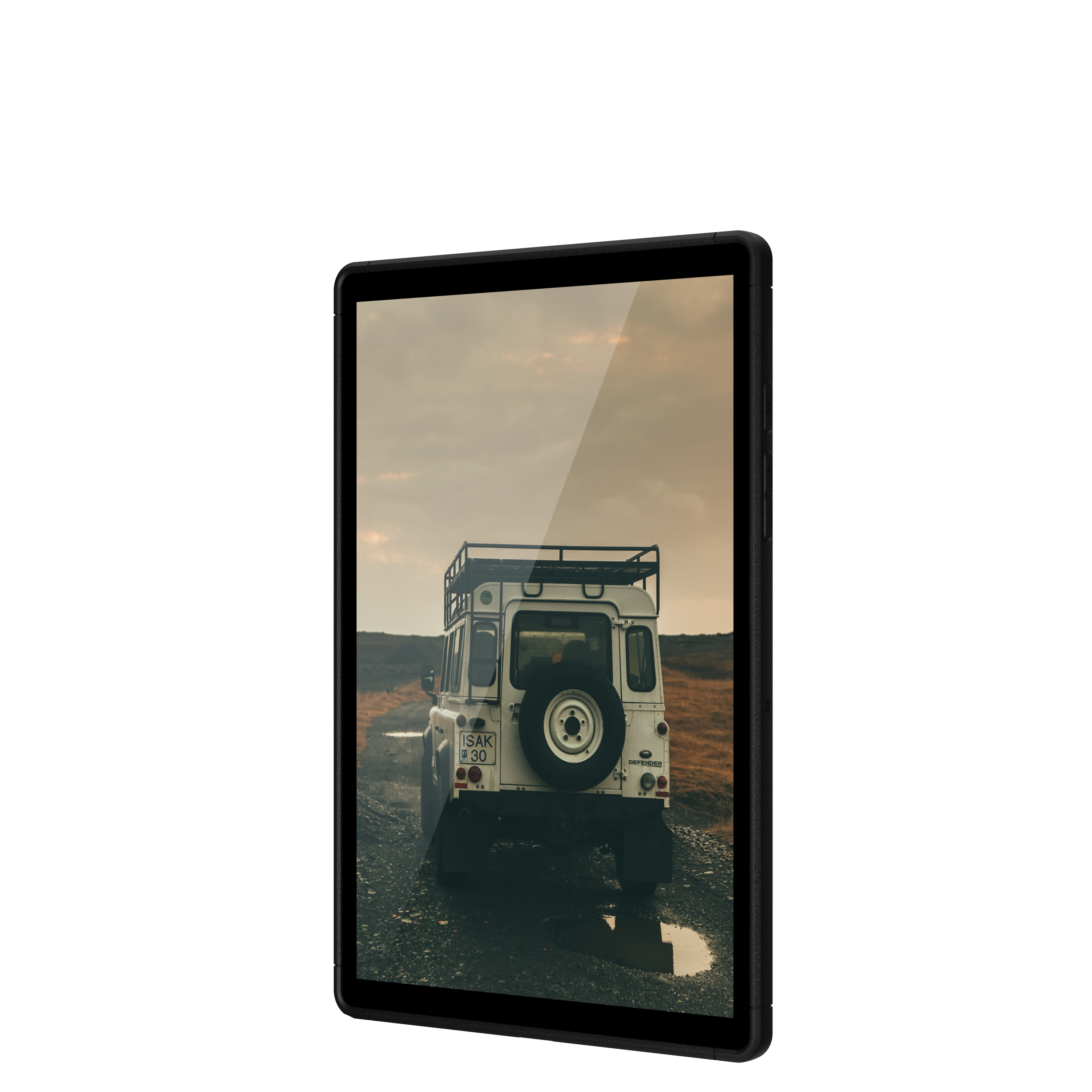 Tablet showing a car on a dirt road with an overcast sky.