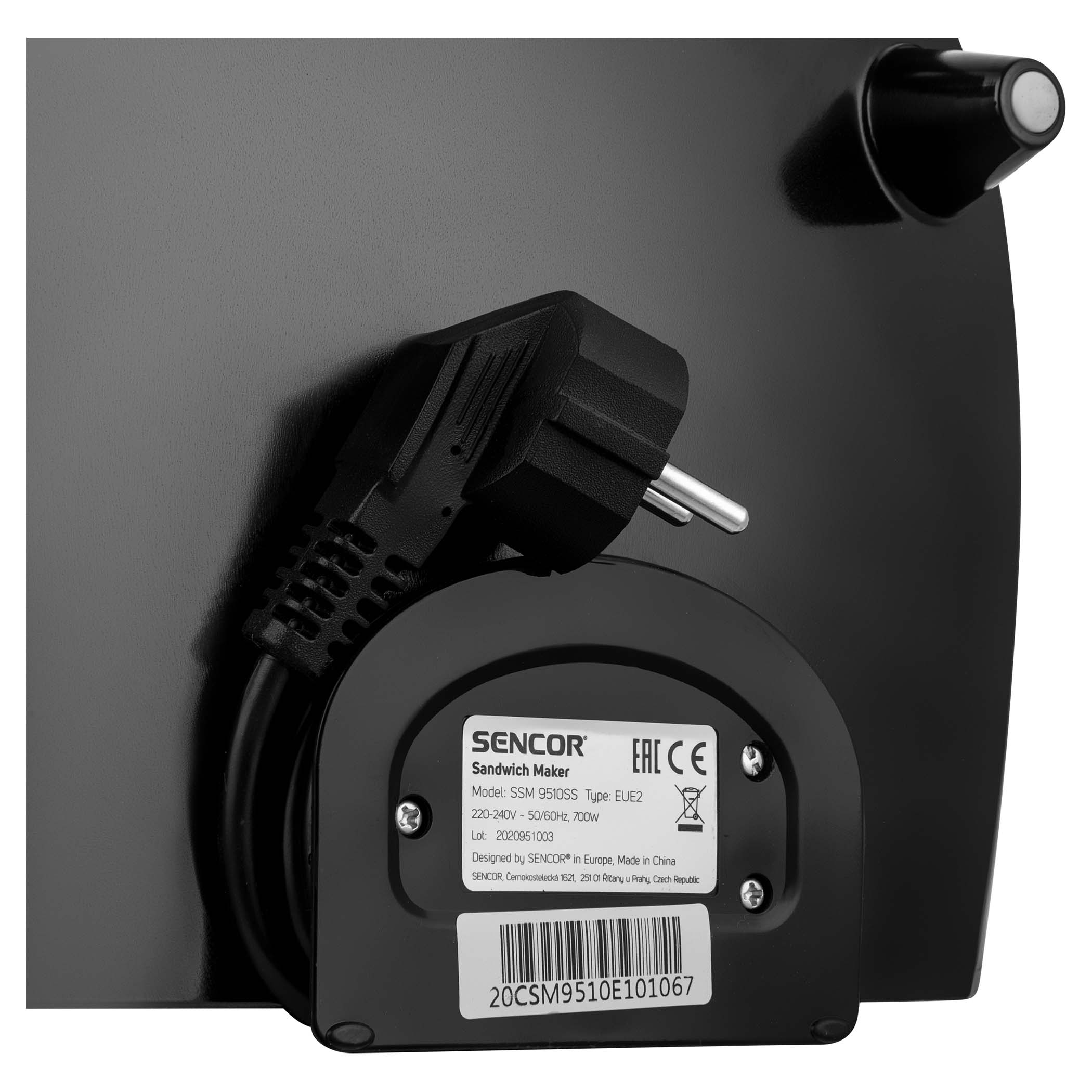 Close-up of a black sandwich maker's back. Power cord, plug, and label visible.