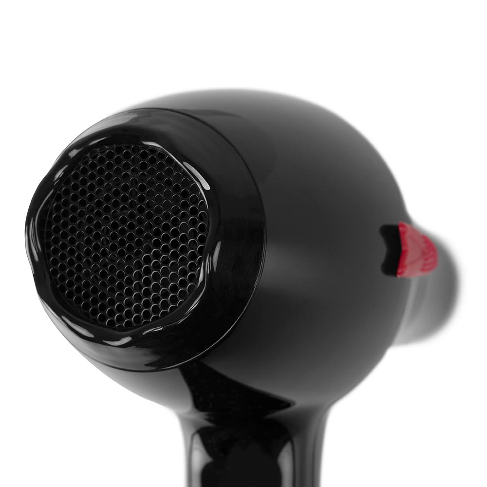 Zbliżenie czarnej głowicy suszarki z siatką i czerwonym przyciskiem.