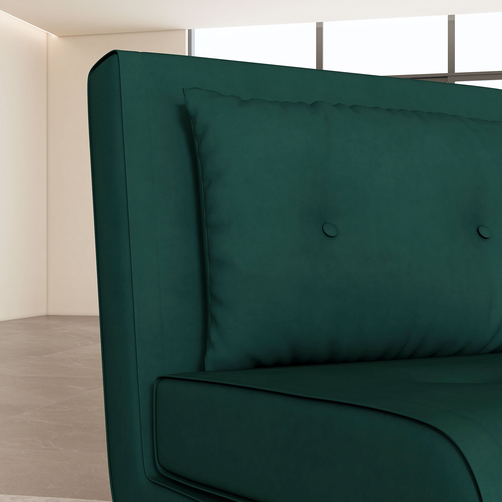Nahaufnahme eines dunkelgrünen Samtsofas mit passendem Kissen, zeigt Knopfdetails und eine glatte Oberfläche.