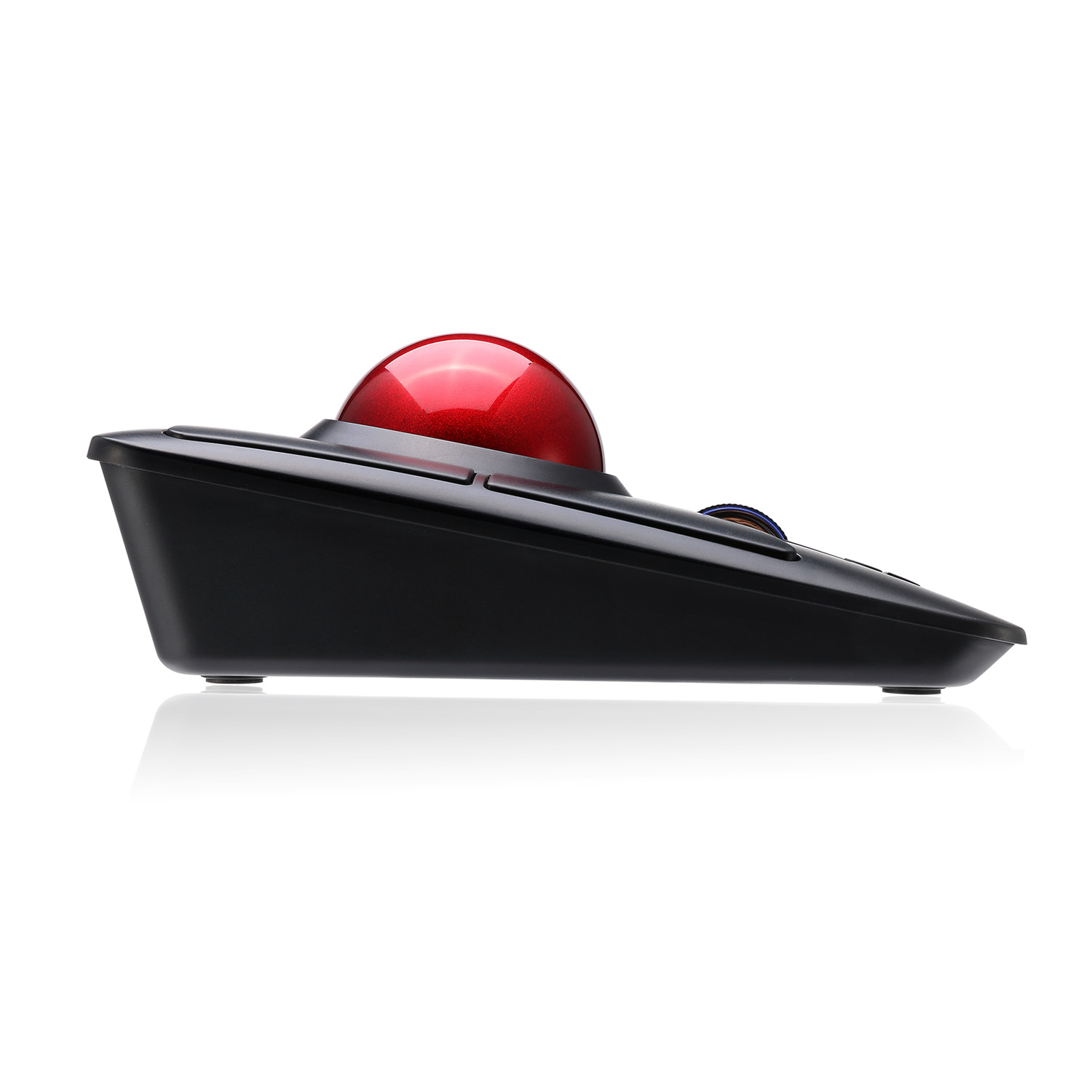 A black trackball mouse with a red trackball and white background with reflection.