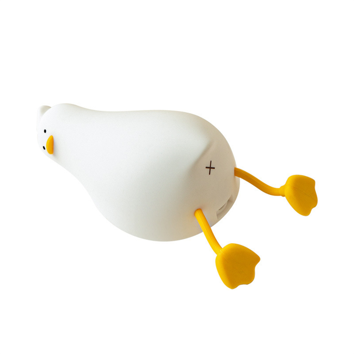 Weiße, Enten-förmige Lampe mit gelben Füßen. Die Ente liegt auf dem Rücken.