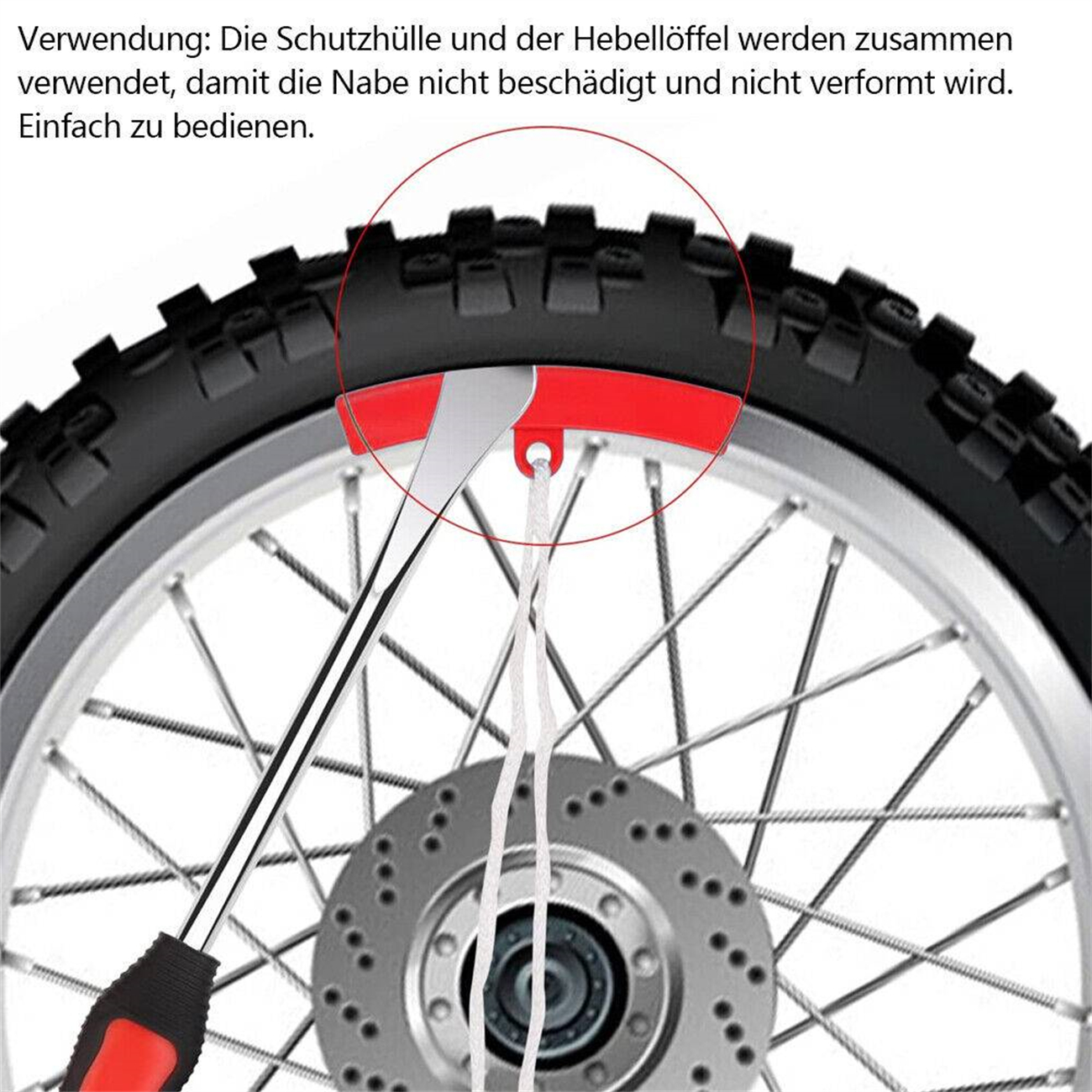Ein Reifenrad mit einem roten Werkzeug, das einen weißen Faden einführt.