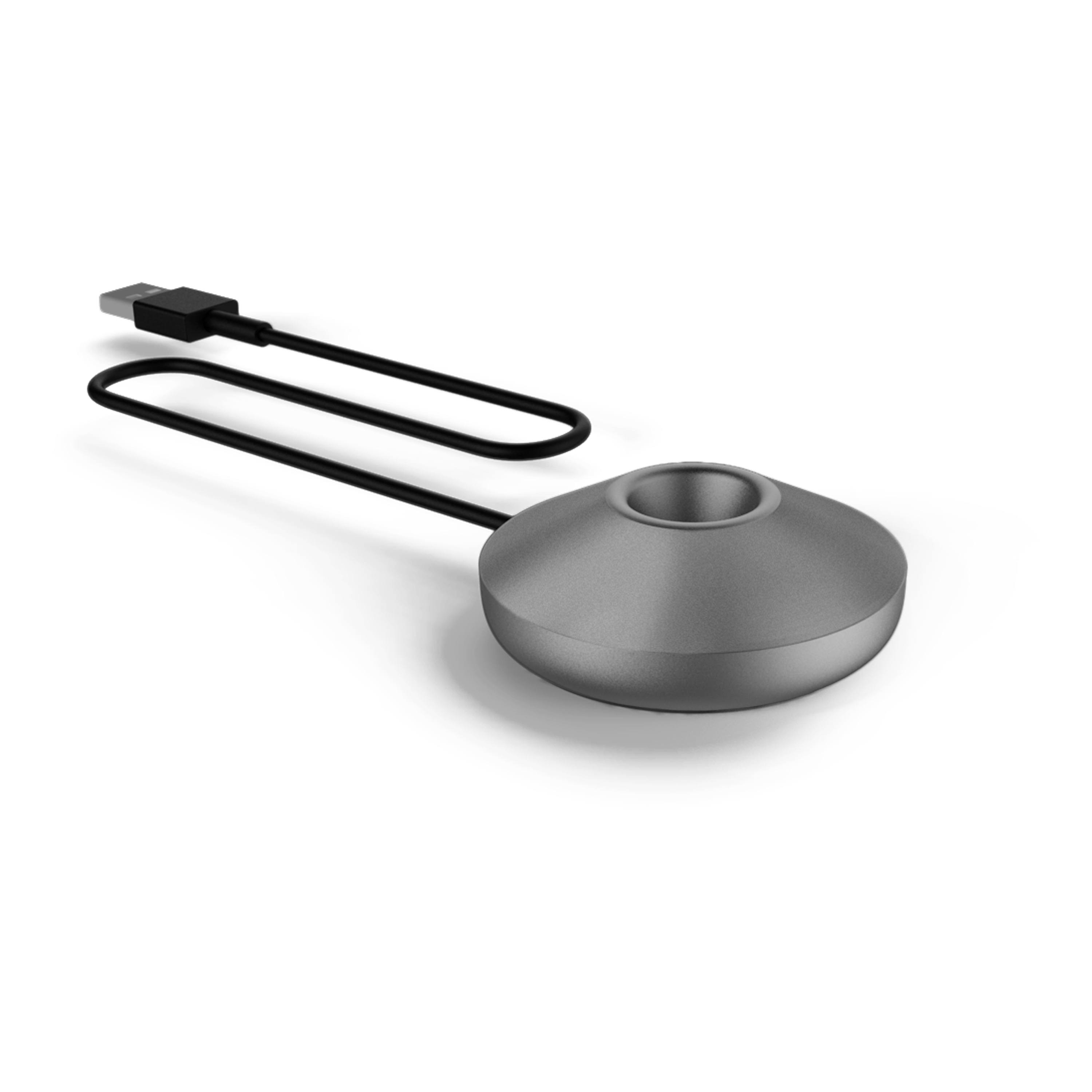 Silver charging base with a black USB cable connected. It is on a white surface.