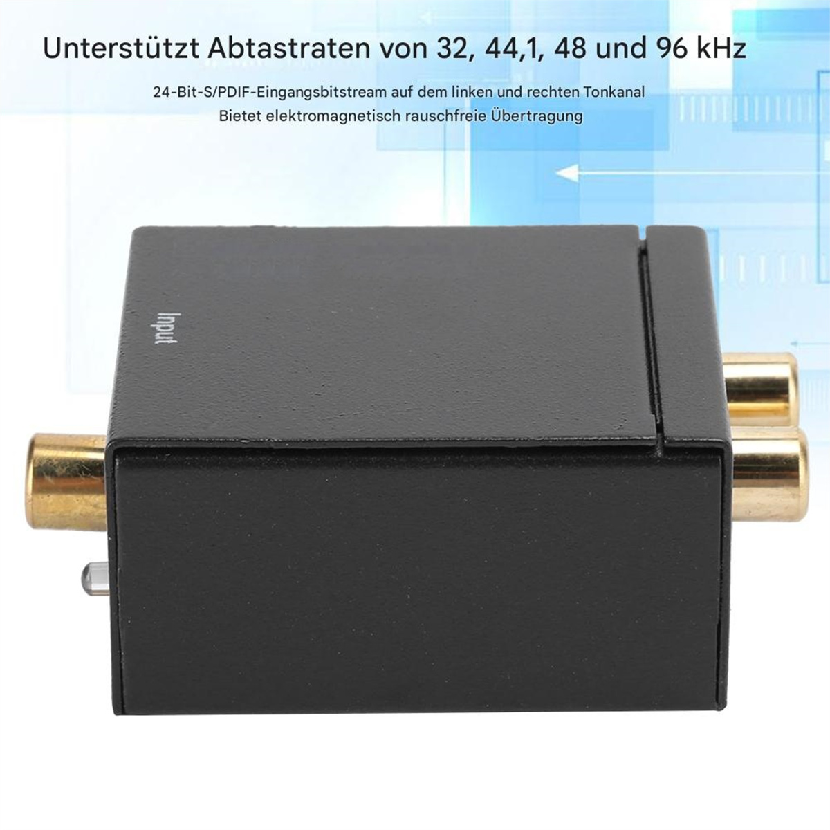 Ein schwarzer Audio-Konverter mit goldfarbenen Cinch-Anschlüssen. Er hat Eingangsanschlüsse.