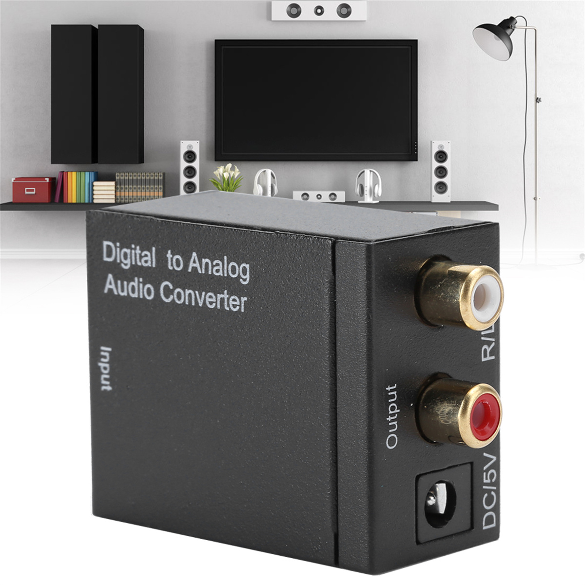 Ein schwarzer Digital-Analog-Audio-Konverter mit Ein- und Ausgangsanschlüssen und DC-Stromeingang.