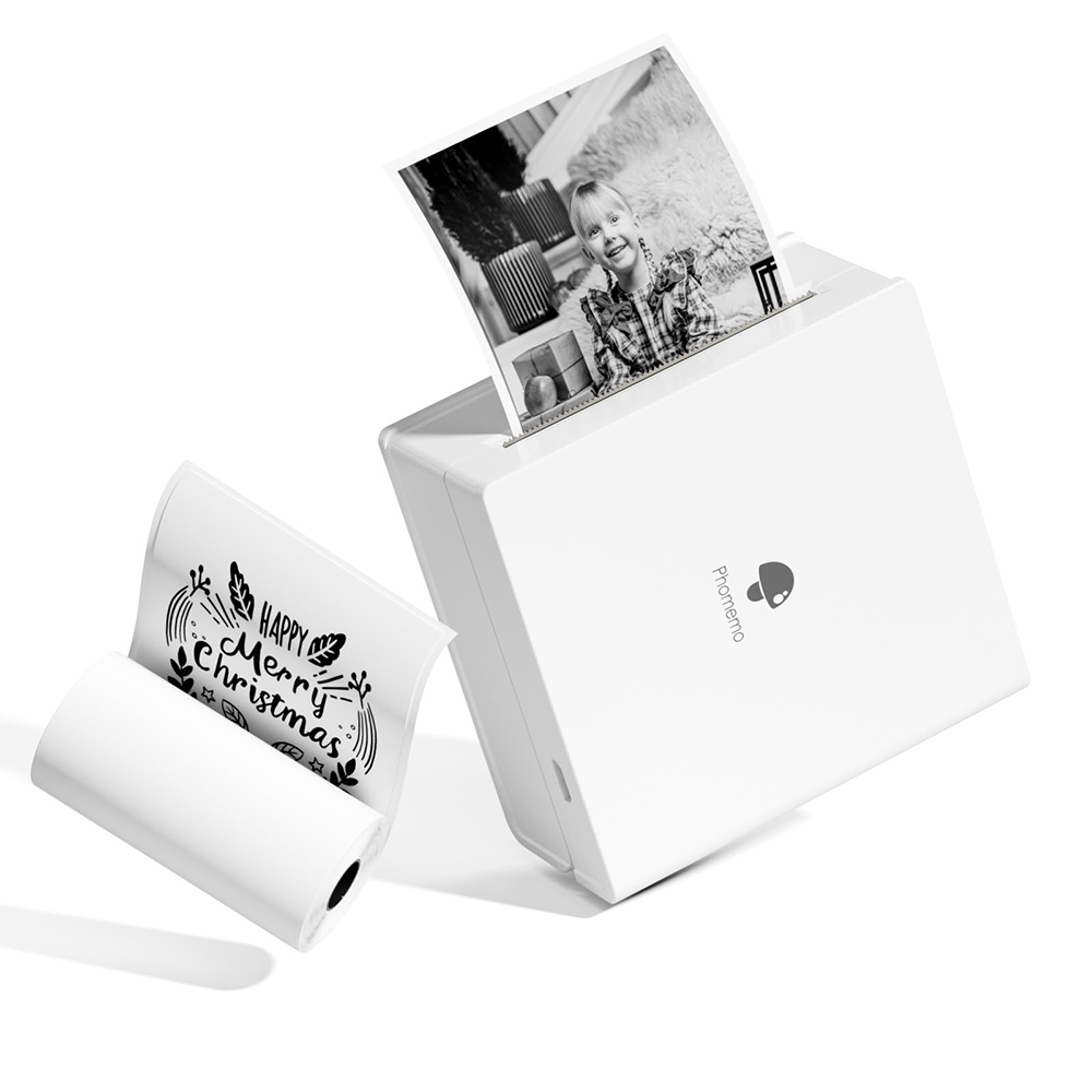 Weißer Fotodrucker mit Papierrolle und gedrucktem Foto. Zeigt Weihnachtsbotschaft.