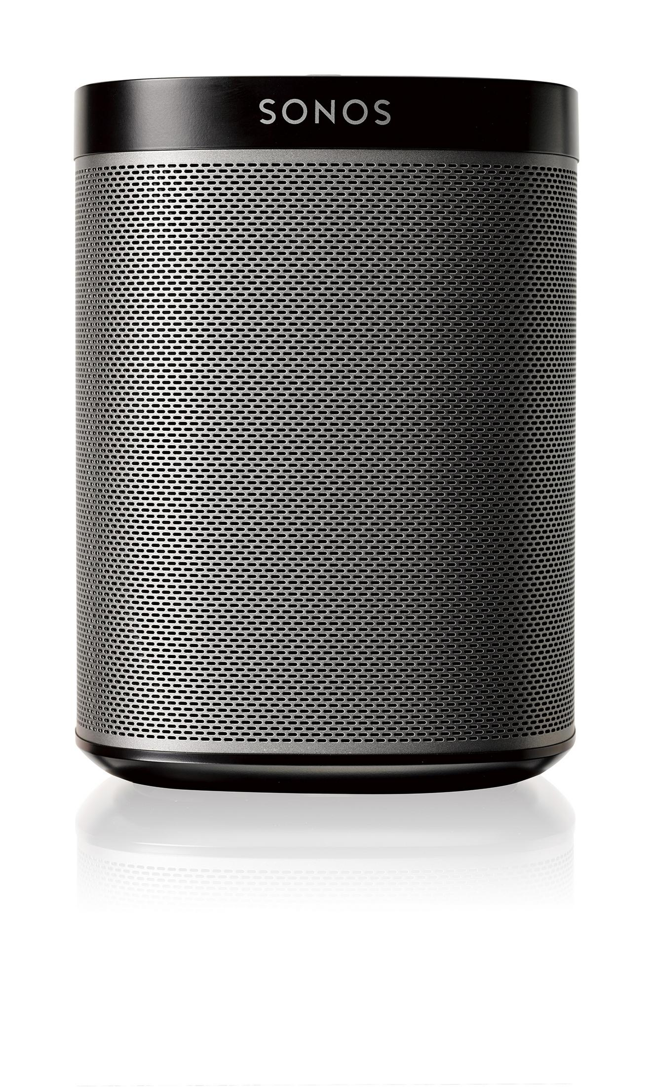 Ein schwarzer Sonos-Lautsprecher auf einer weißen Oberfläche, der sich spiegelt.