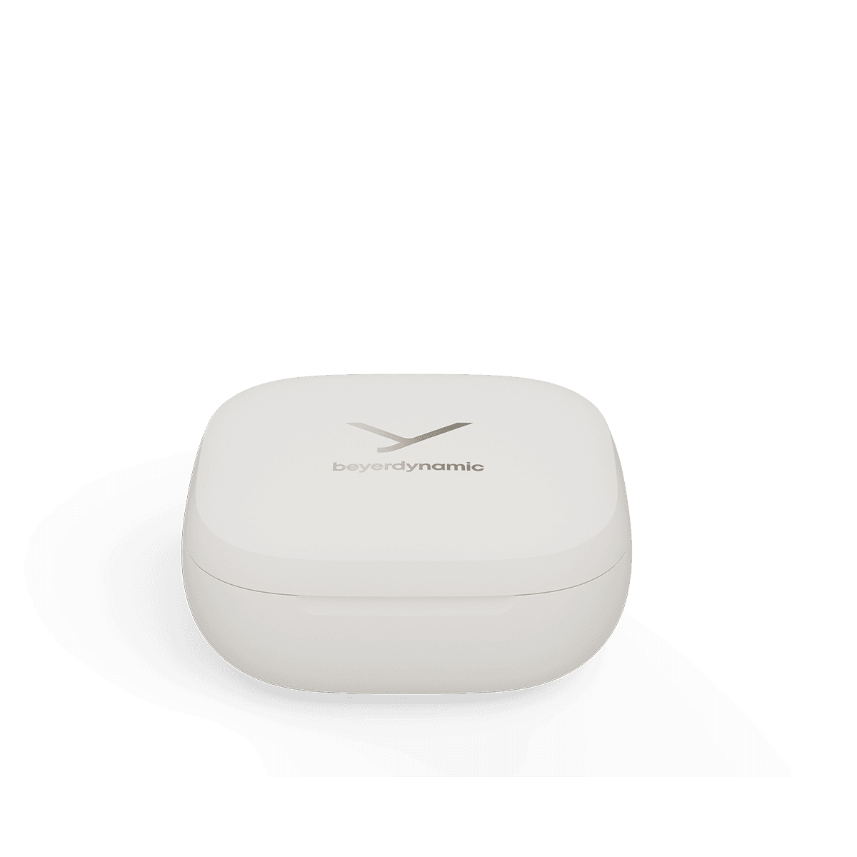 Un dispositivo quadrato bianco con un logo beyerdynamic argentato. Si trova su una superficie bianca.