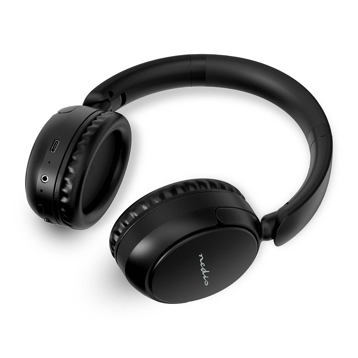 Casque noir sur une surface blanche. Les écouteurs sont visibles, montrant l'intérieur.