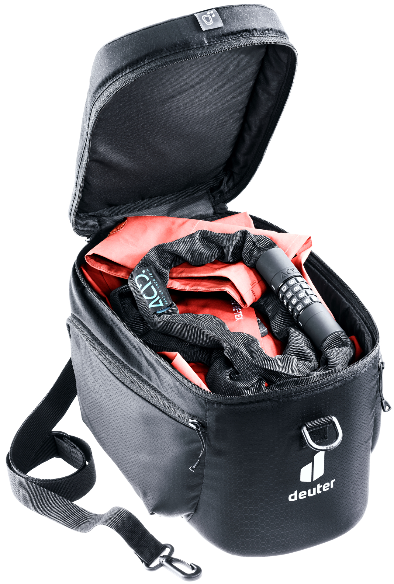 Schwarze Tasche mit Inhalt: Schloss, roter Beutel und andere Artikel. Geöffnet.