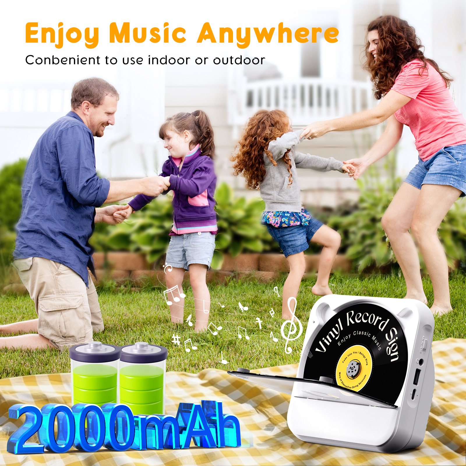 Eine vierköpfige Familie tanzt zu Musik aus einem weißen Vinyl-Plattenspieler.