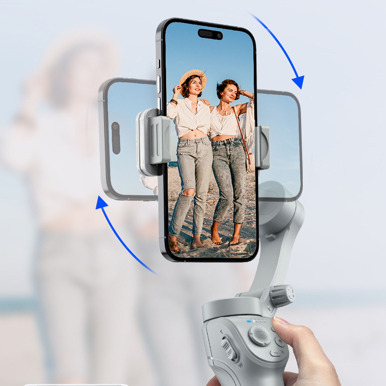 Telefon in einem Gimbal, der sich dreht, um den Bildschirm zu zeigen. Zwei Frauen auf dem Bildschirm.