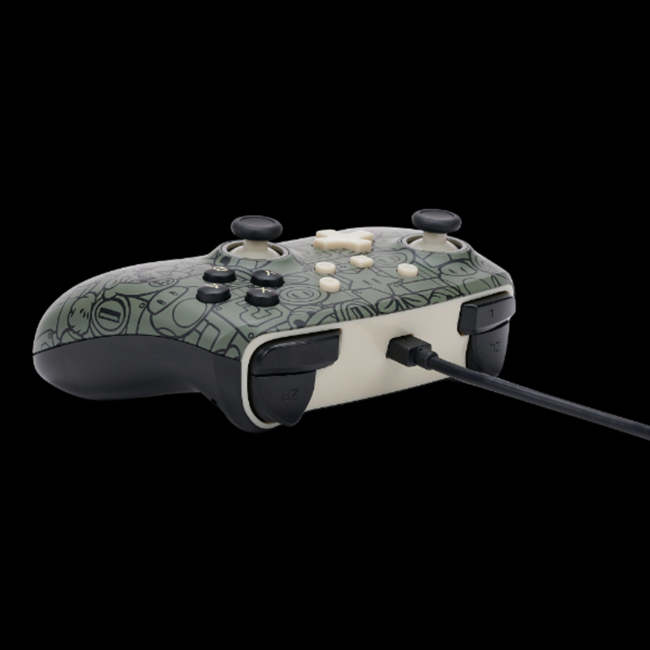 Kontroler do gier wideo z czarnym tłem.