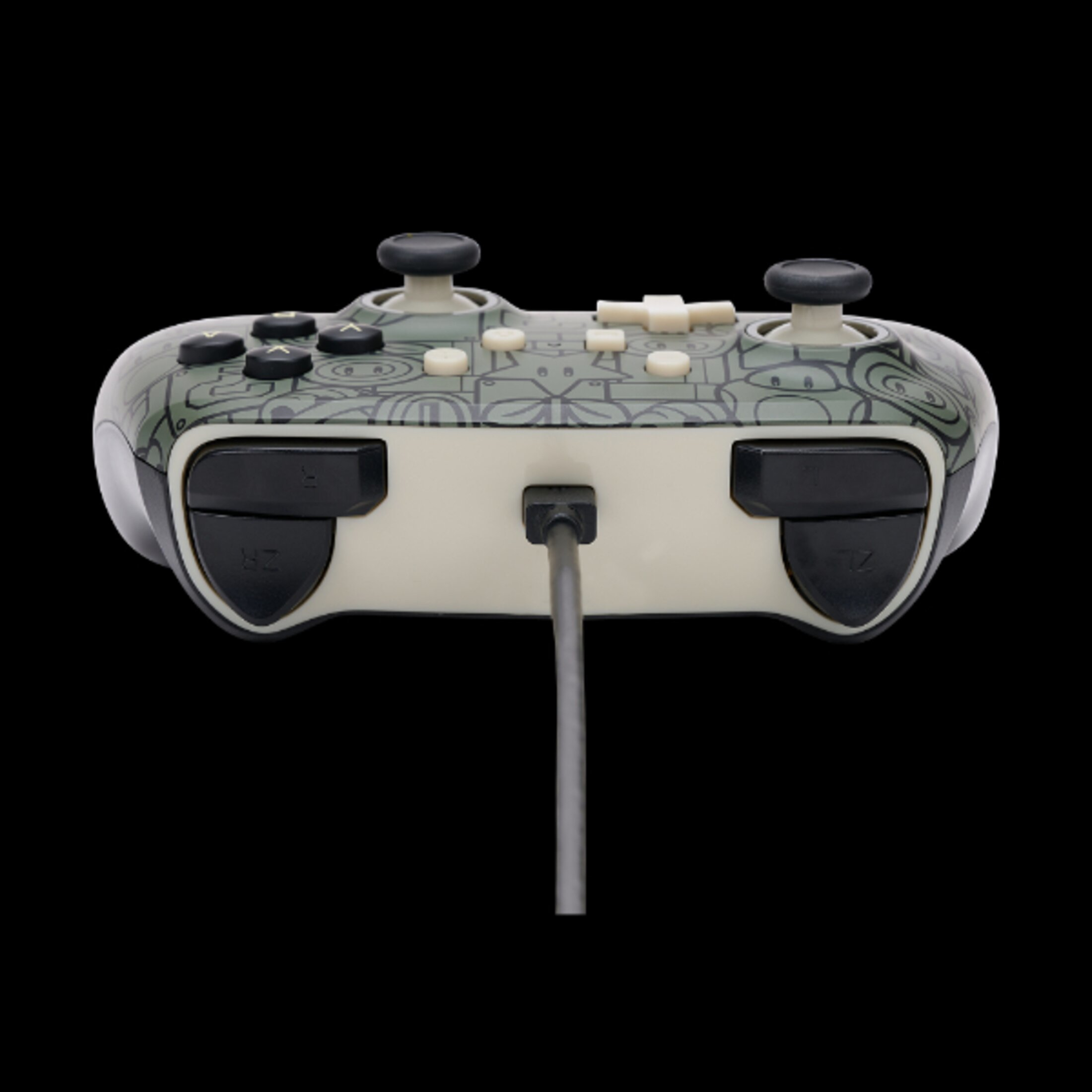 Czarno-szary kontroler do gier z przyciskami i drążkami analogowymi. Podłączony jest kabel.