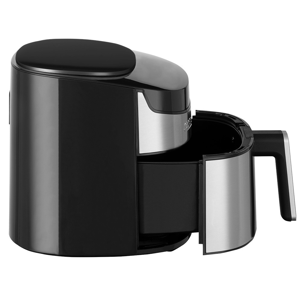 Czarna i srebrna frytkownica powietrzna z otwartą szufladą. Na białym tle.