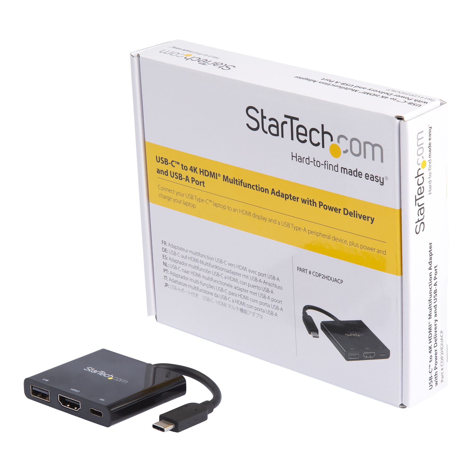 Una scatola e un adattatore da USB-C a HDMI neri con porta USB-A, su sfondo bianco.