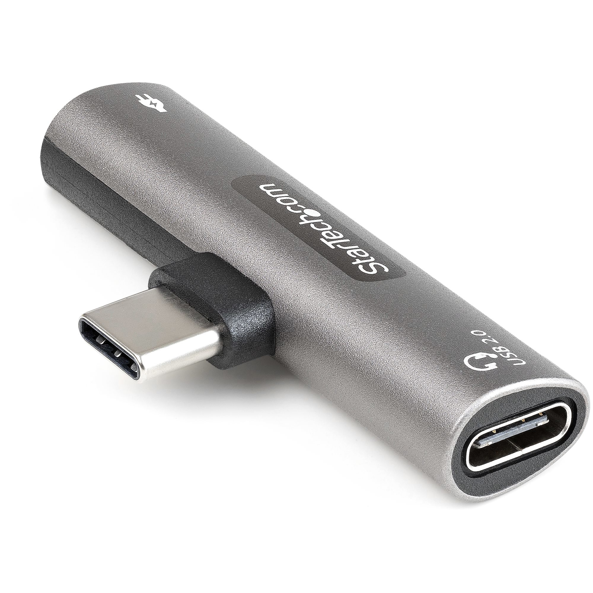 Adaptador USB-C gris. Tiene un puerto USB-C y un puerto USB 2.0. La marca Startech.com está en el lateral.