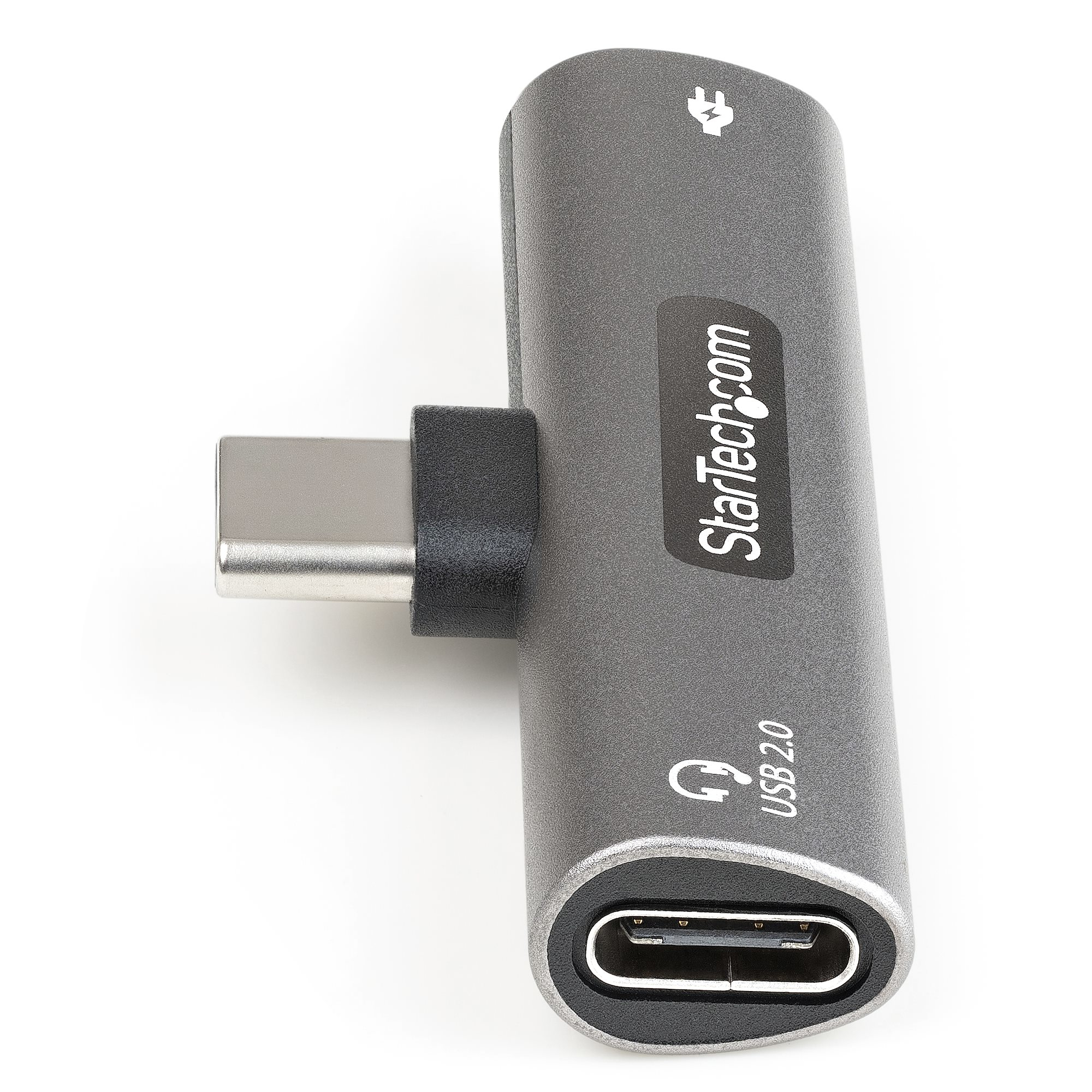 Adaptador USB-C a USB 2.0 gris y negro. Cuenta con un conector USB-C y un puerto USB 2.0.