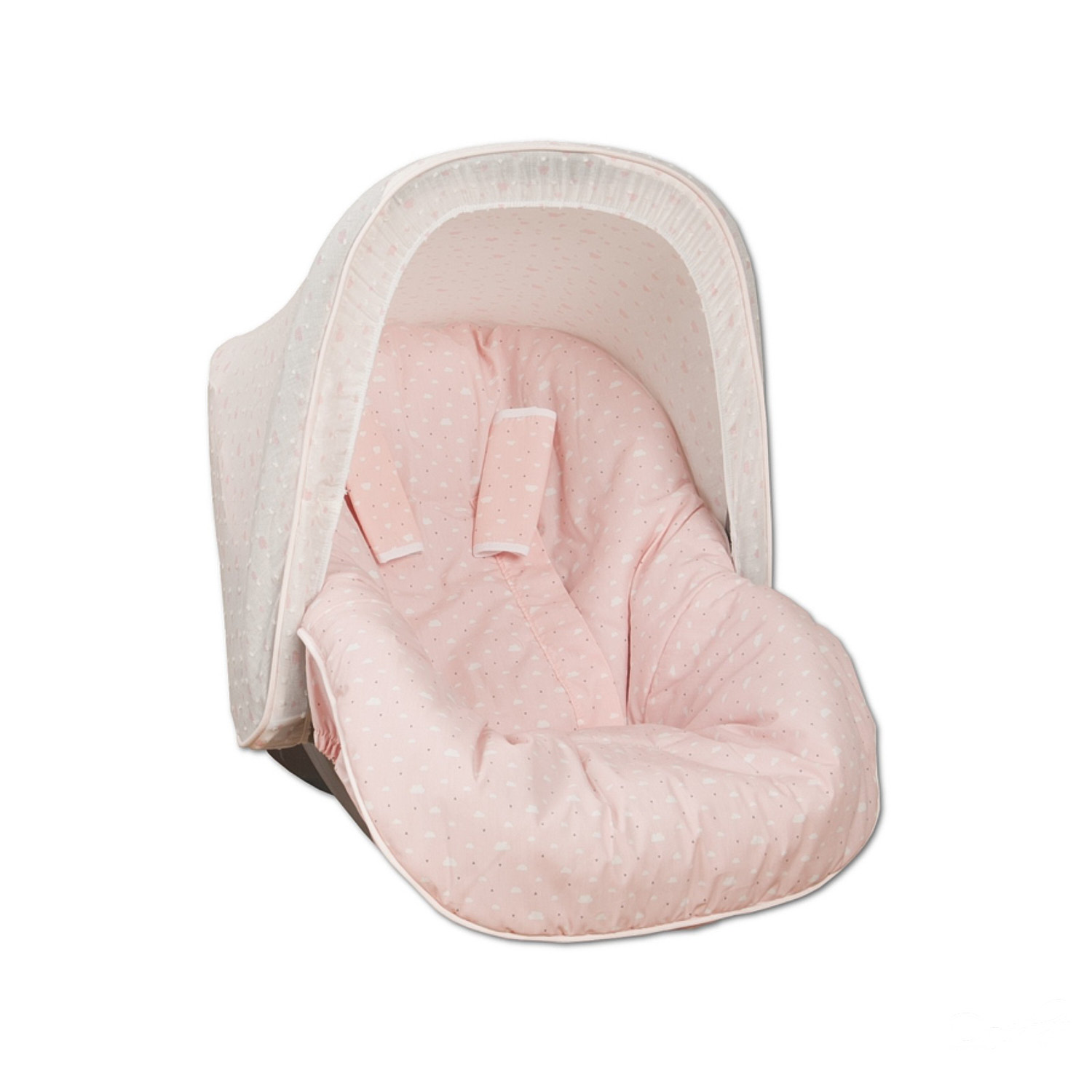 Silla de coche para bebé rosa y blanca. Tiene capota y cojín rosa con lunares blancos.
