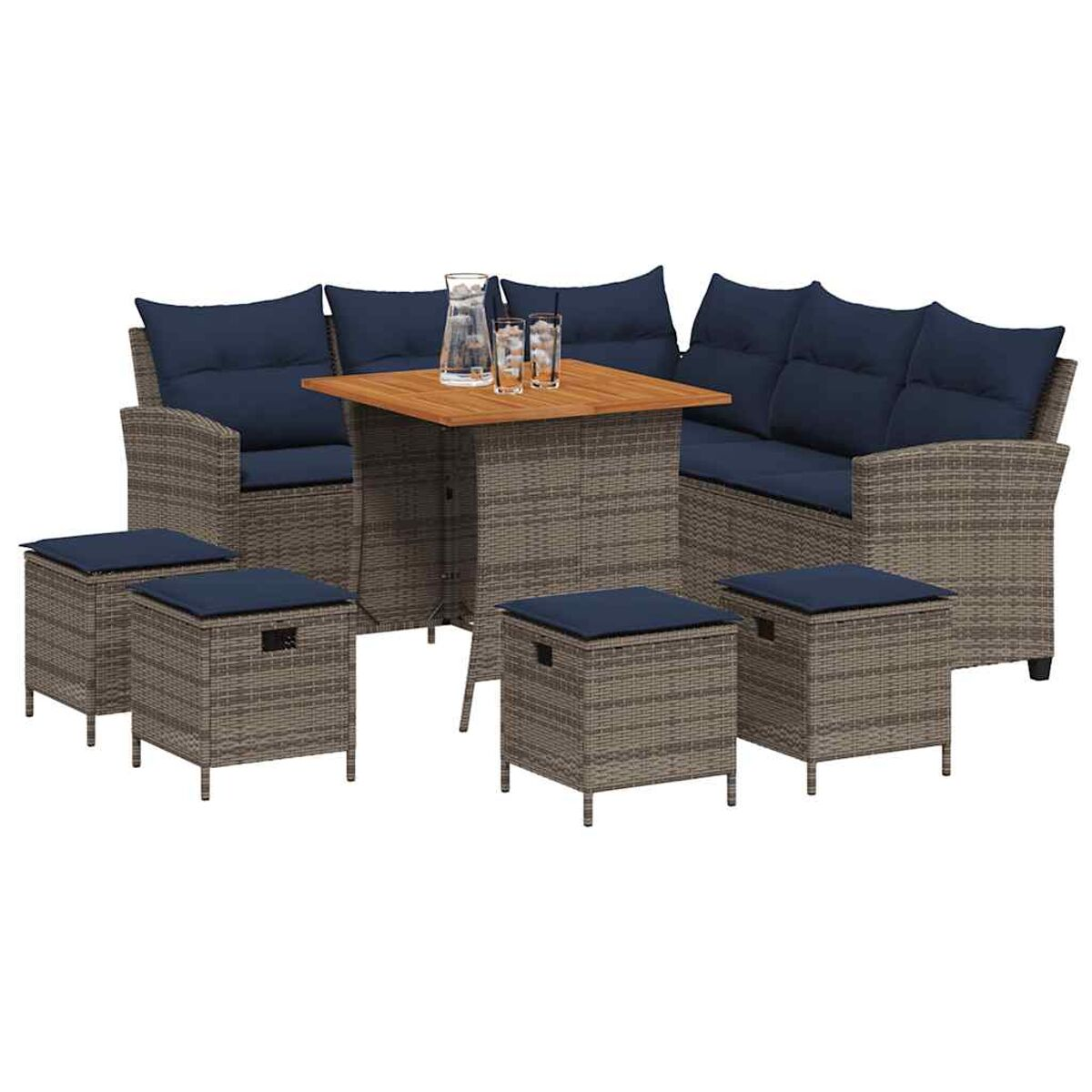 Un set da patio all'aperto con un tavolo e sgabelli con cuscini blu. Il set è realizzato in materiale di vimini.