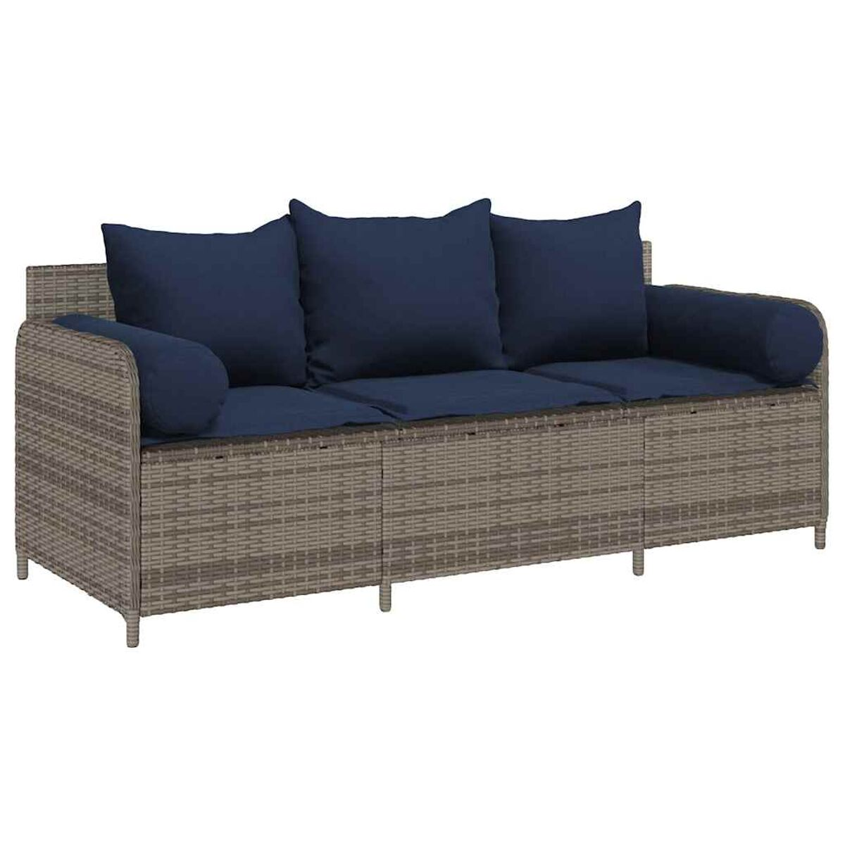 Un divano in rattan grigio con cuscini blu navy e due cuscini cilindrici blu navy.
