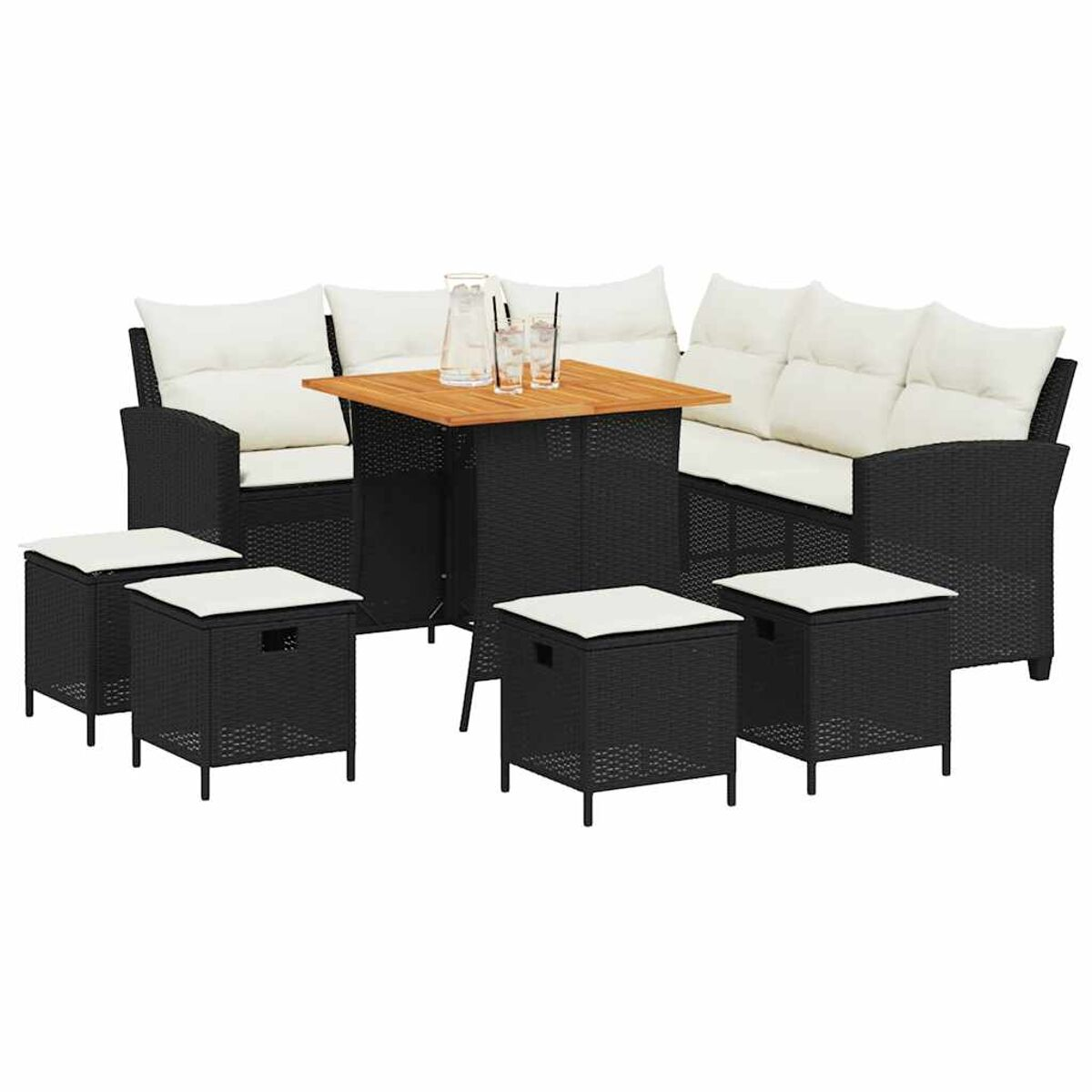 Set di mobili da esterno in rattan nero con tavolo quadrato, tre divani e quattro sgabelli con cuscini bianchi.