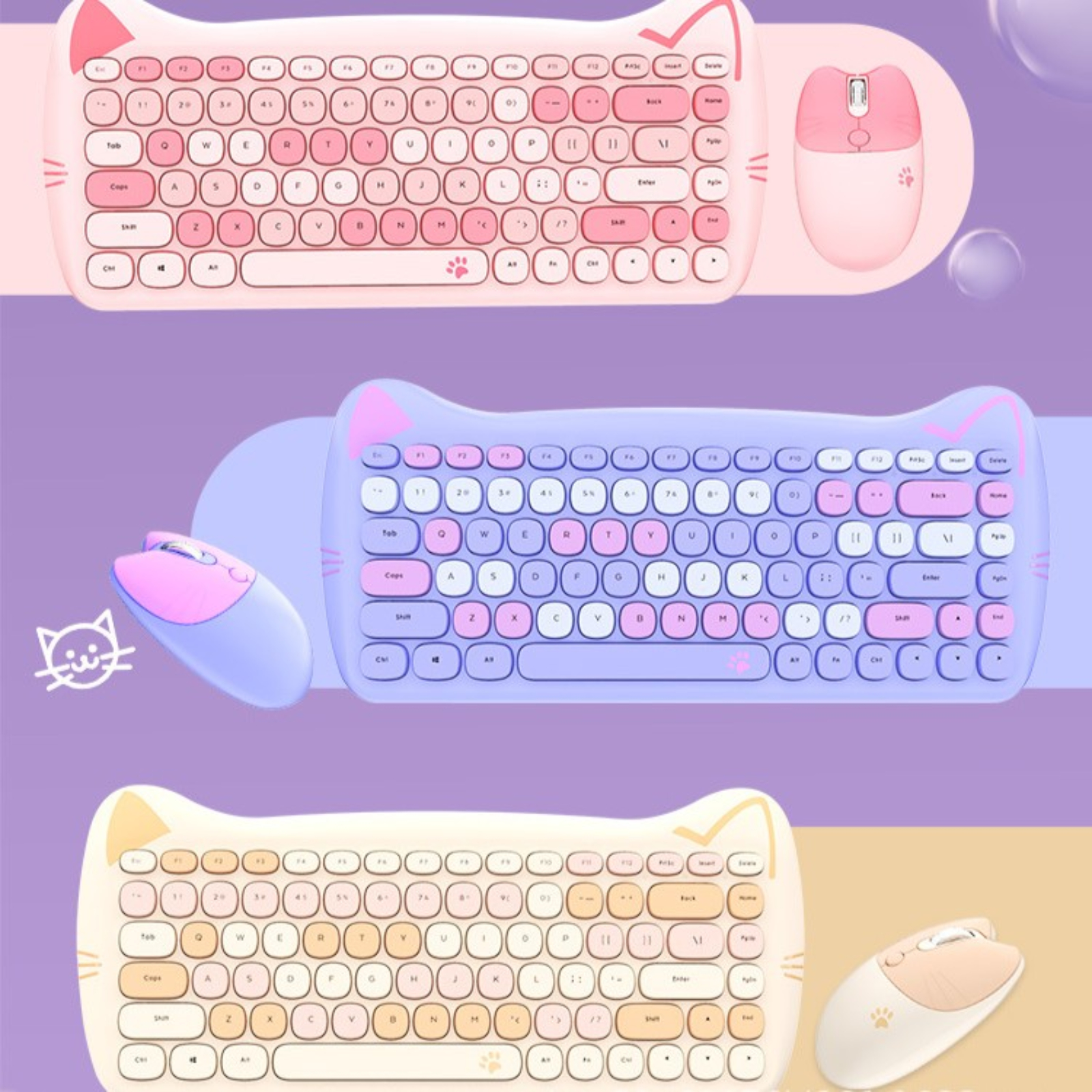 Drei katzenförmige Tastaturen und Mäuse in Pink, Blau und Gelb auf buntem Hintergrund.