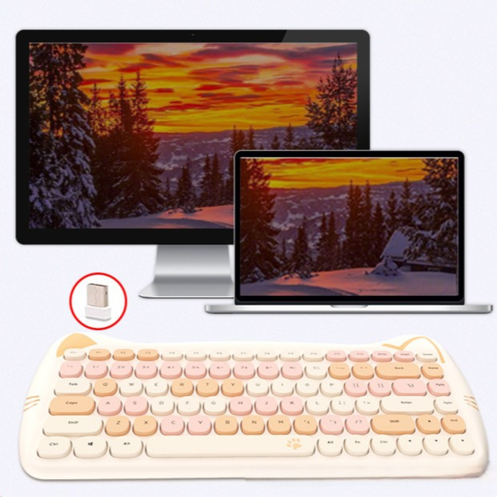 Eine katzenförmige kabellose Tastatur mit Maus-Empfänger und Monitor mit Sonnenuntergangsbild