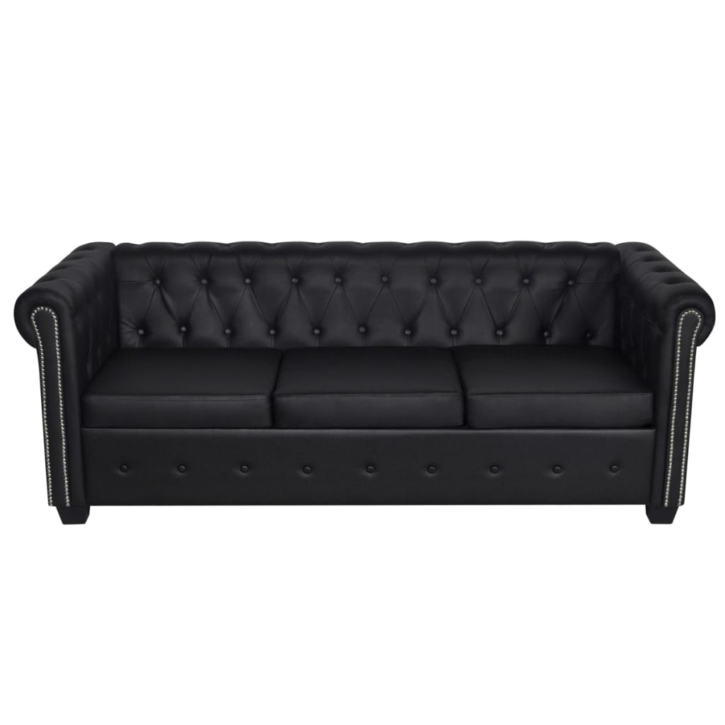 Schwarzes Ledersofa mit Knöpfen und silbernen Nieten.