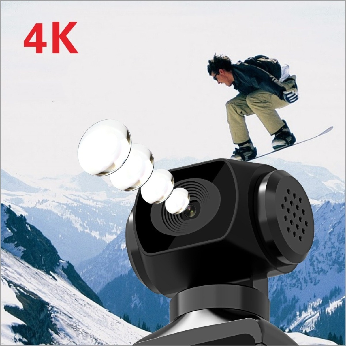 Eine schwarze Kamera mit Lichtern und ein Snowboarder im Hintergrund.