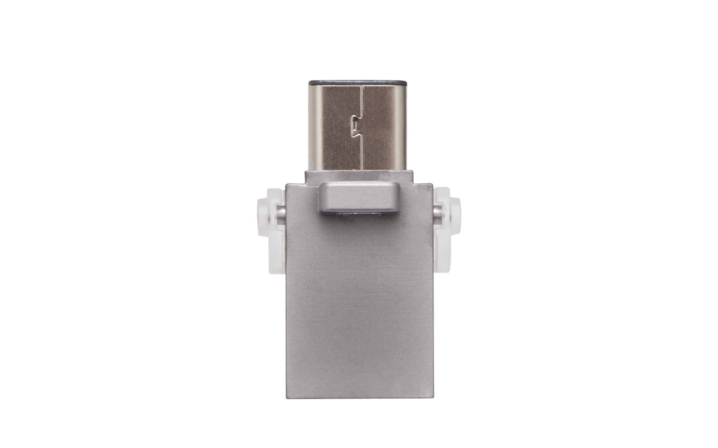 Un'unità USB argentata con un connettore USB-C. È vista dall'estremità del connettore.