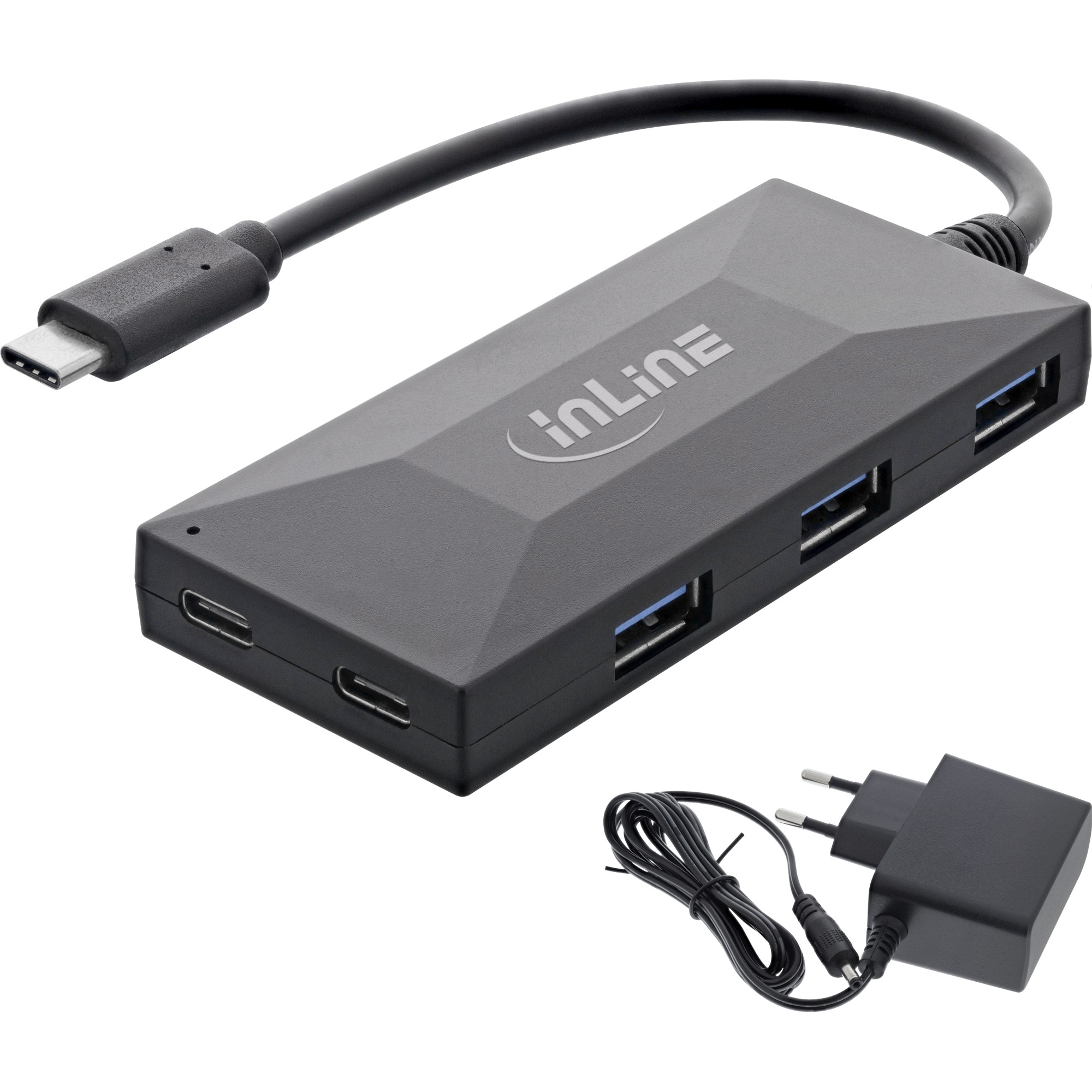 Hub USB nero con più porte USB, un adattatore di alimentazione e un connettore USB-C.