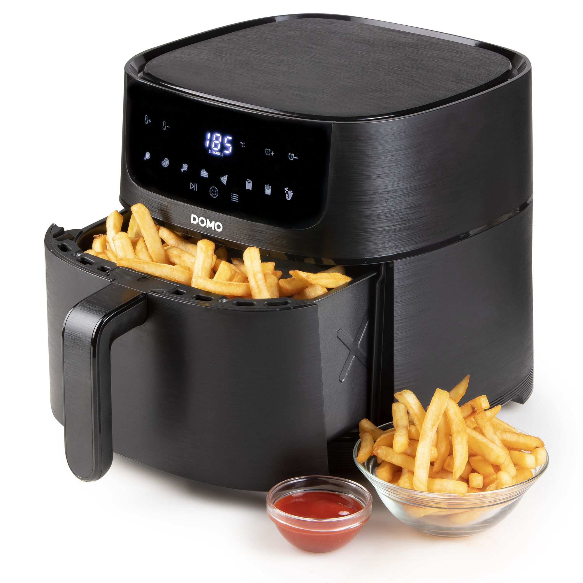 Schwarze Heißluftfritteuse mit Pommes im Korb, Ketchup in einer Schüssel. Anzeige bei 185 Grad.