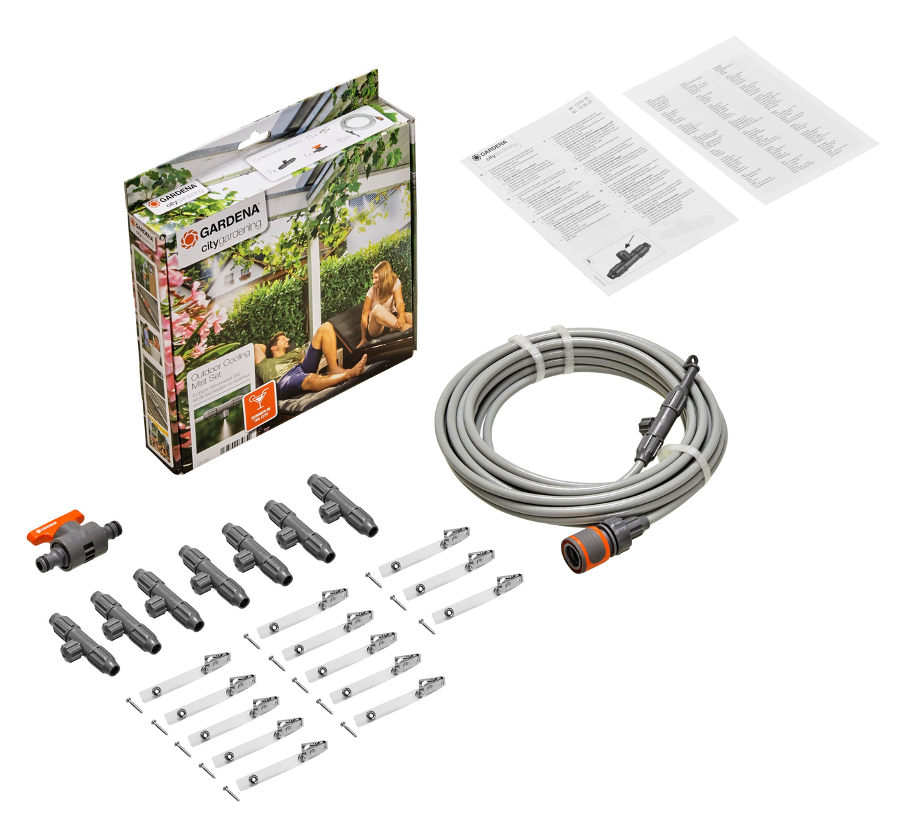 Eine Box eines Gartenbewässerungssystems mit verschiedenen Teilen, einschließlich Schläuchen und Anschlüssen.