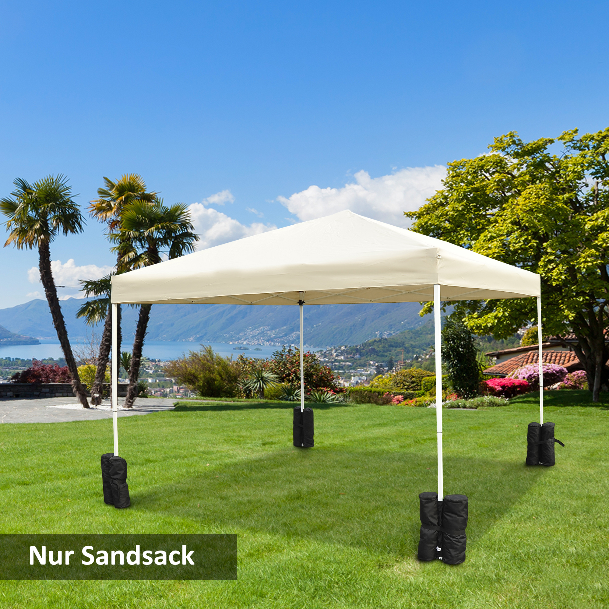 Ein weißes Pavillon-Zelt auf einer grünen Wiese. Schwarze Sandsäcke verankern das Zelt.