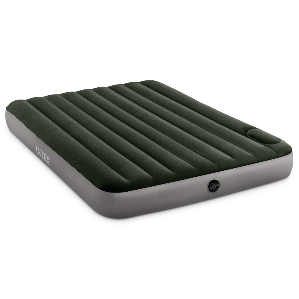 Matelas gonflable vert foncé sur fond blanc. Comporte des crêtes verticales.
