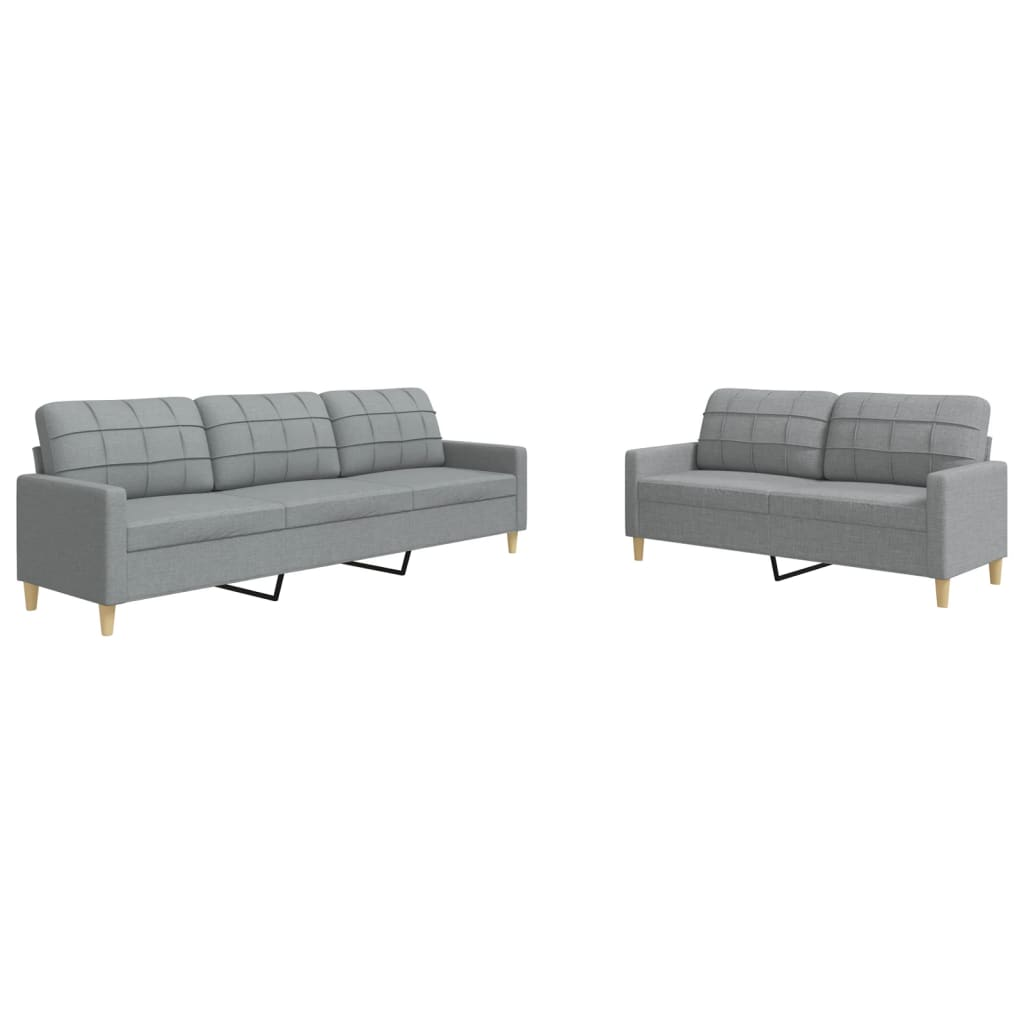 Zwei graue Sofas sind abgebildet. Eines ist ein 3-Sitzer, das andere ein 2-Sitzer-Sofa.