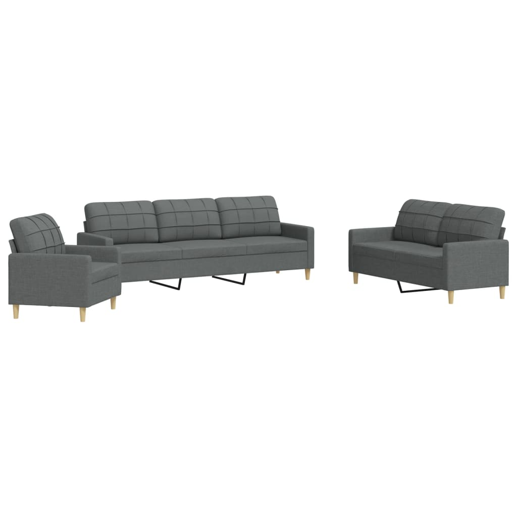 Ein graues Sofaset mit einem Dreisitzer-Sofa, zwei Sesseln und einem Zweisitzer-Sofa.