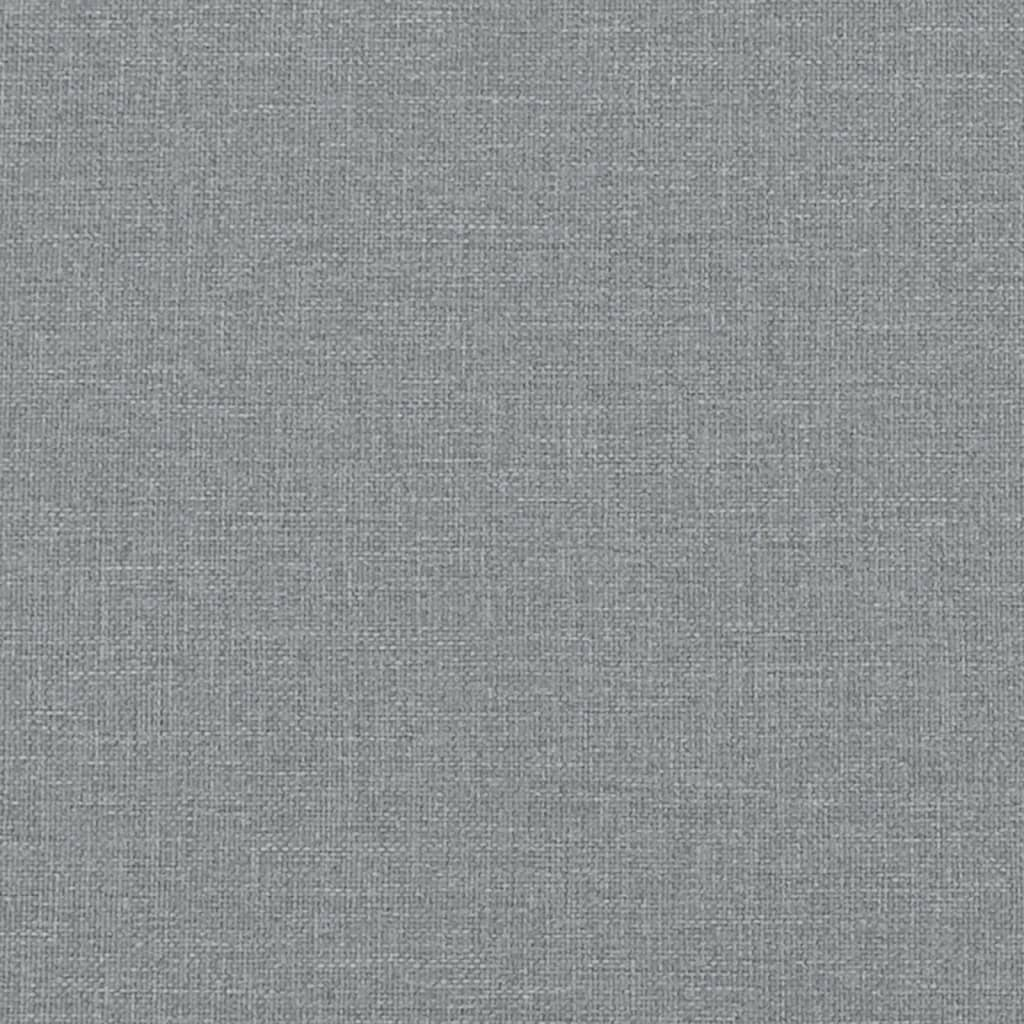 Grauer Textilstoff, eine Nahaufnahme. Der Stoff hat eine sichtbare Textur.