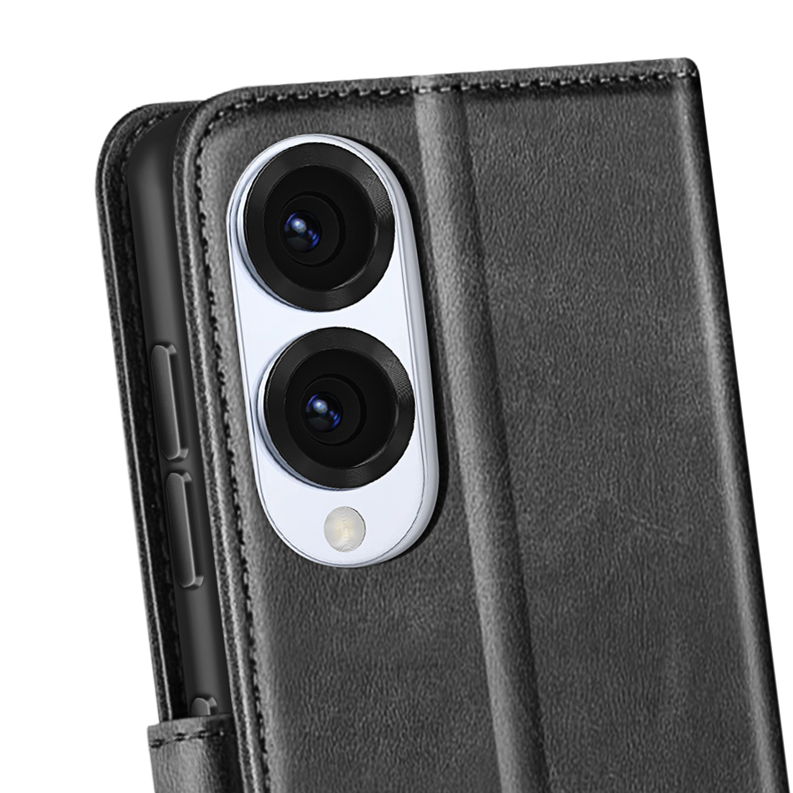 Un primo piano di una custodia nera per telefono con due obiettivi della fotocamera visibili. Gli obiettivi sono in cerchi bianchi.