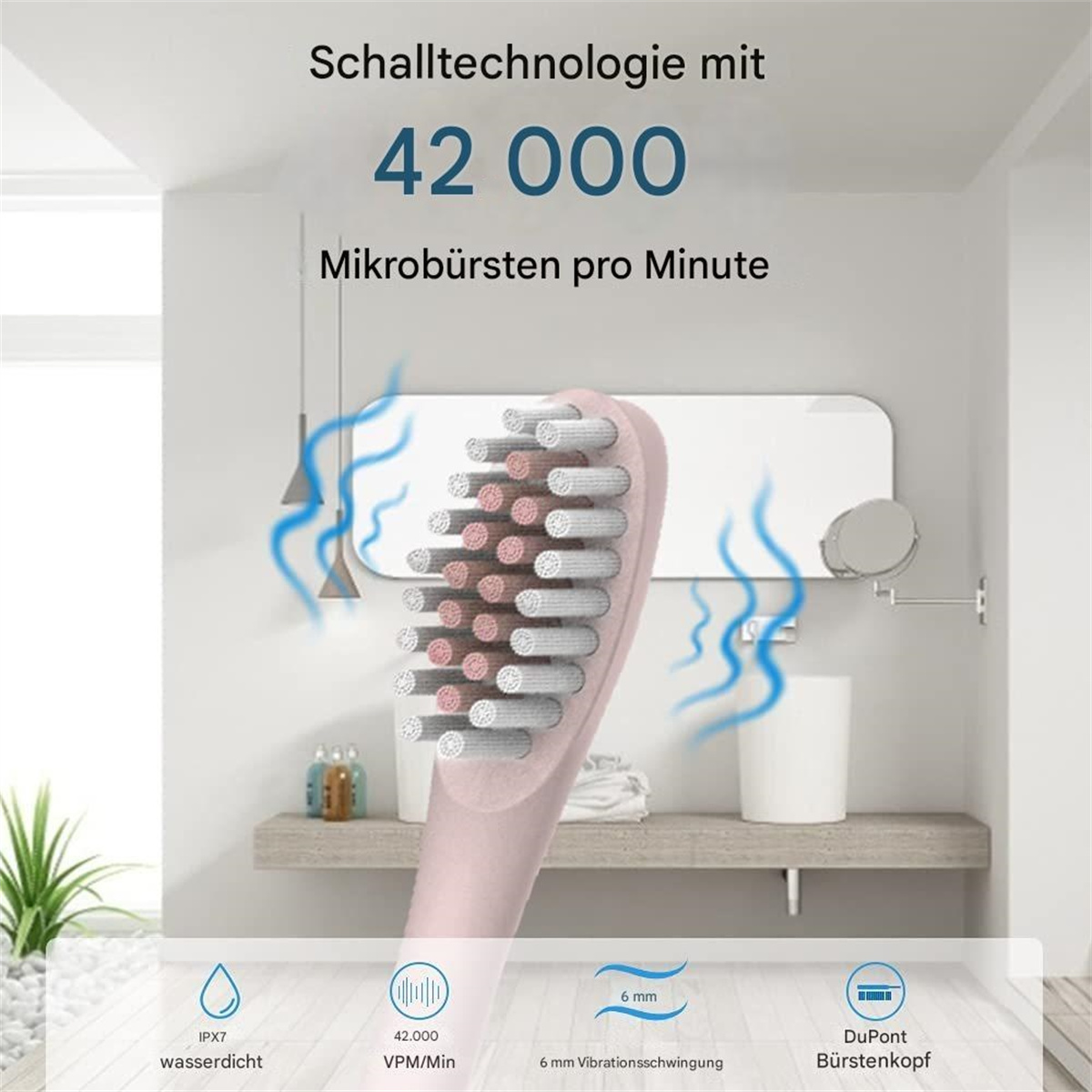 Rosa Zahnbürstenkopf. Text zeigt 42.000 Mikrobürsten pro Minute.