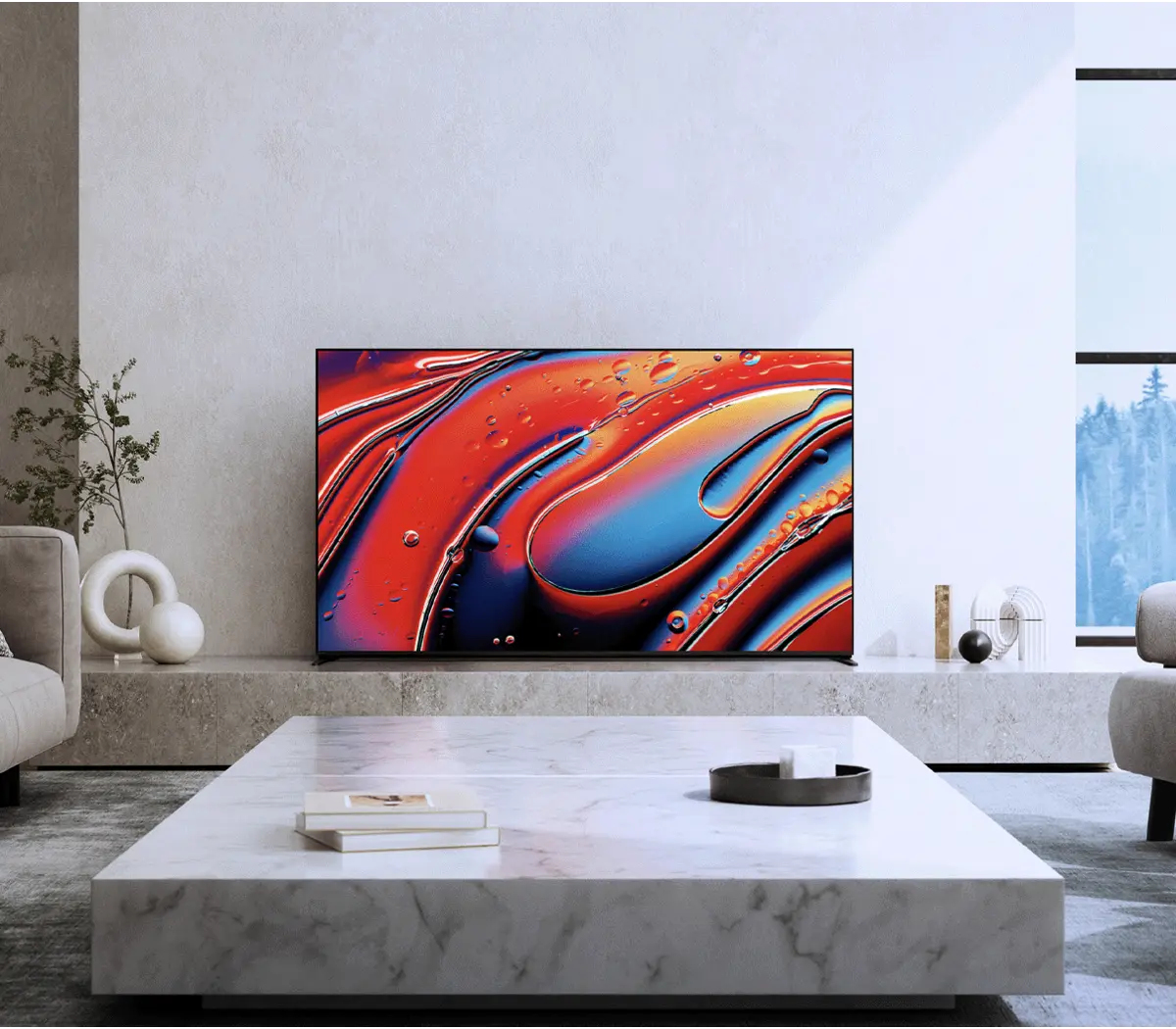 Living room with a large TV displaying abstract artwork, on a marble table. Neutral colors, modern design.