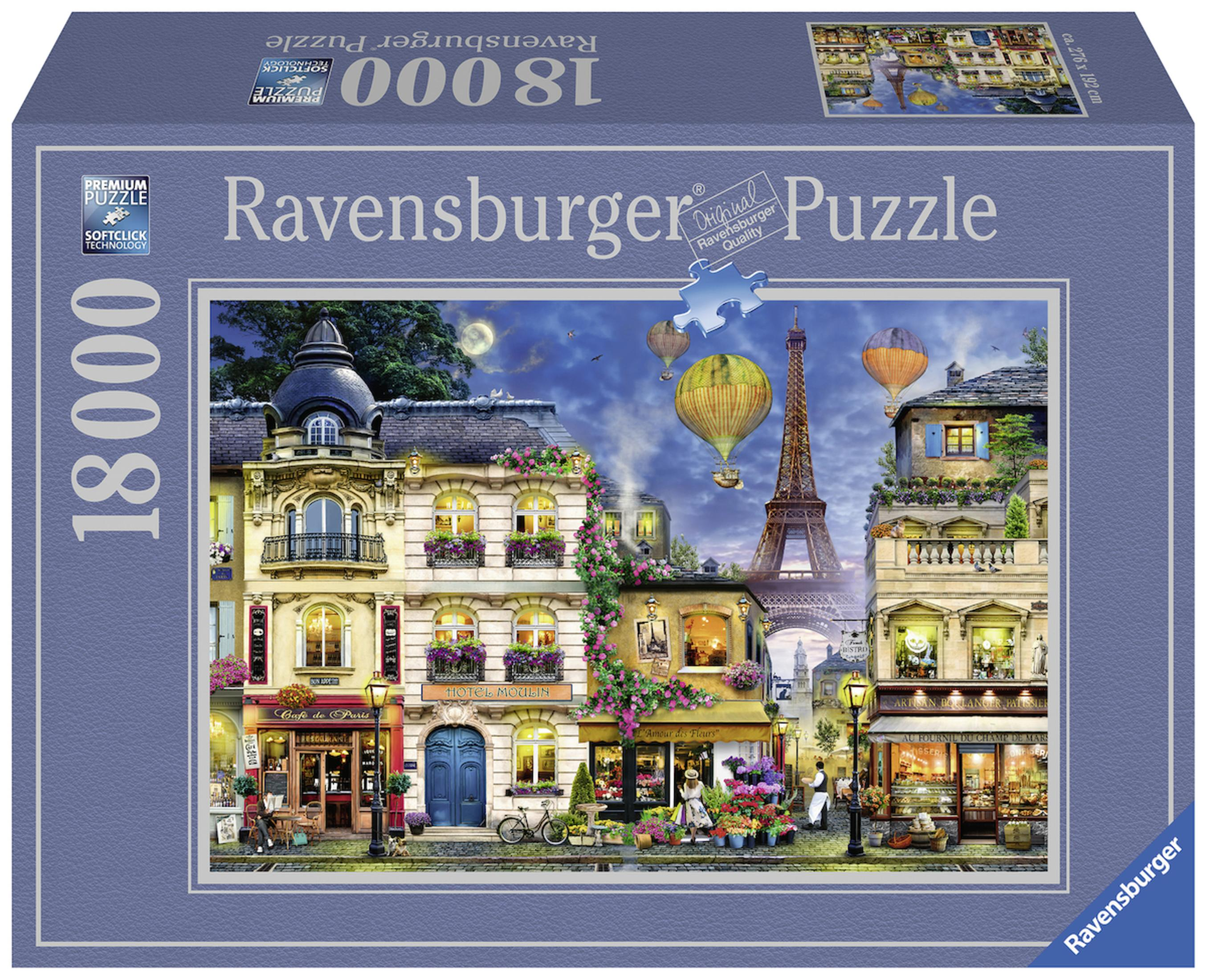 Ravensburger Puzzledose mit einer Pariser Straßenszene mit Gebäuden, Eiffelturm und Heißluftballons.