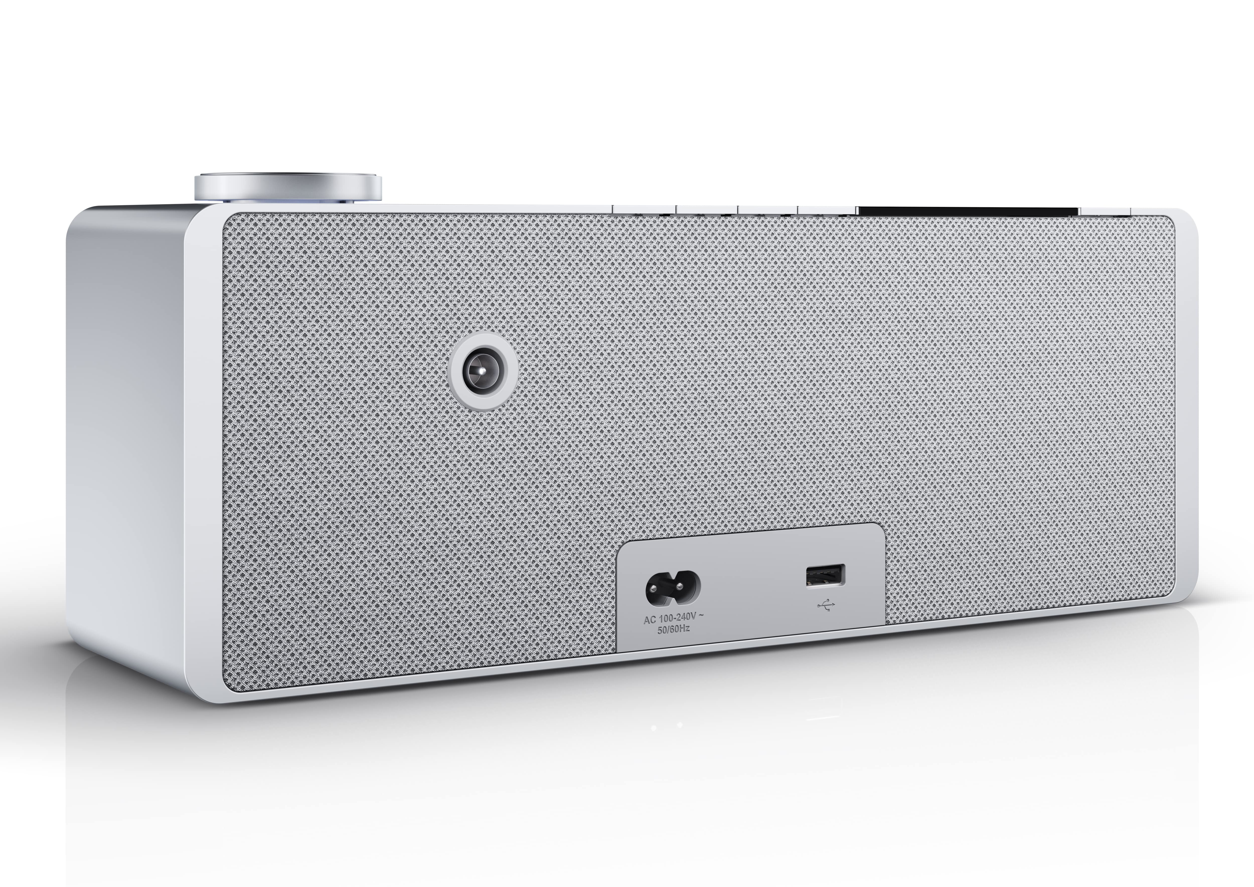 Biały głośnik z małą anteną i portem USB. Tło jest białe.